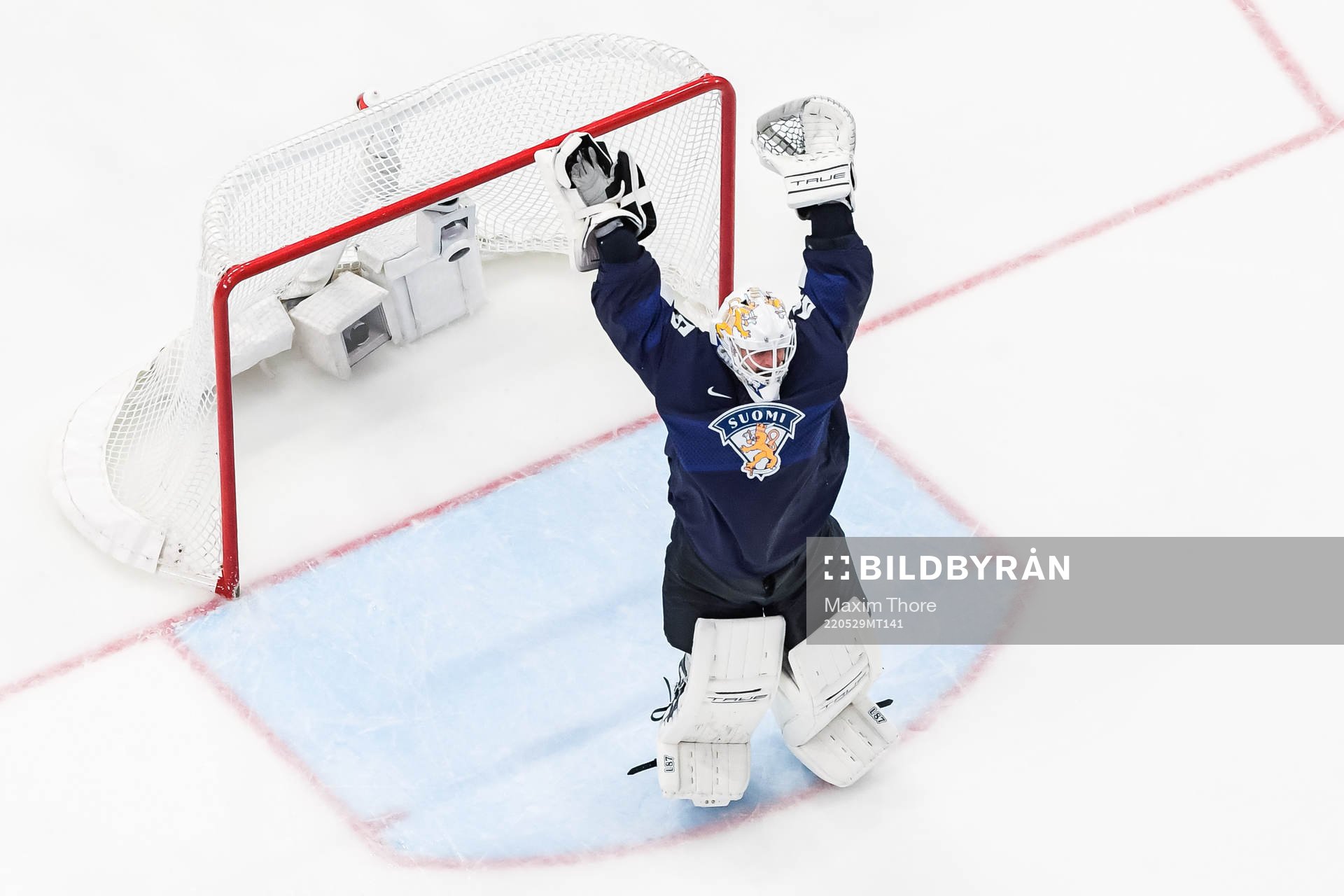 Goaltender Juho Olkinuora of Finland celebrates