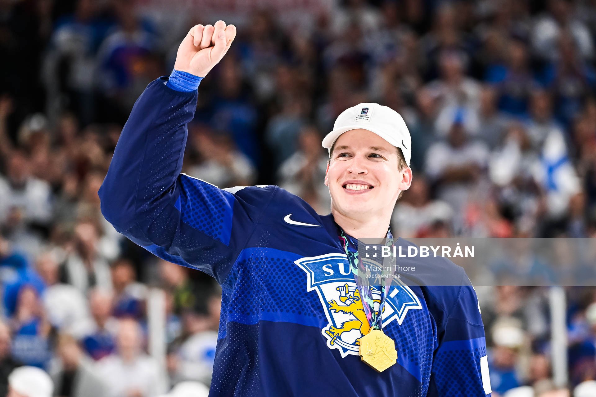 Jere Sallinen of Finland celebrates with gold medal