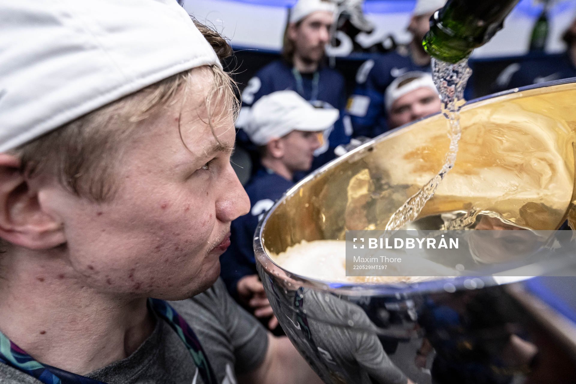 Toni Rajala of Finland celebrate in the locker room