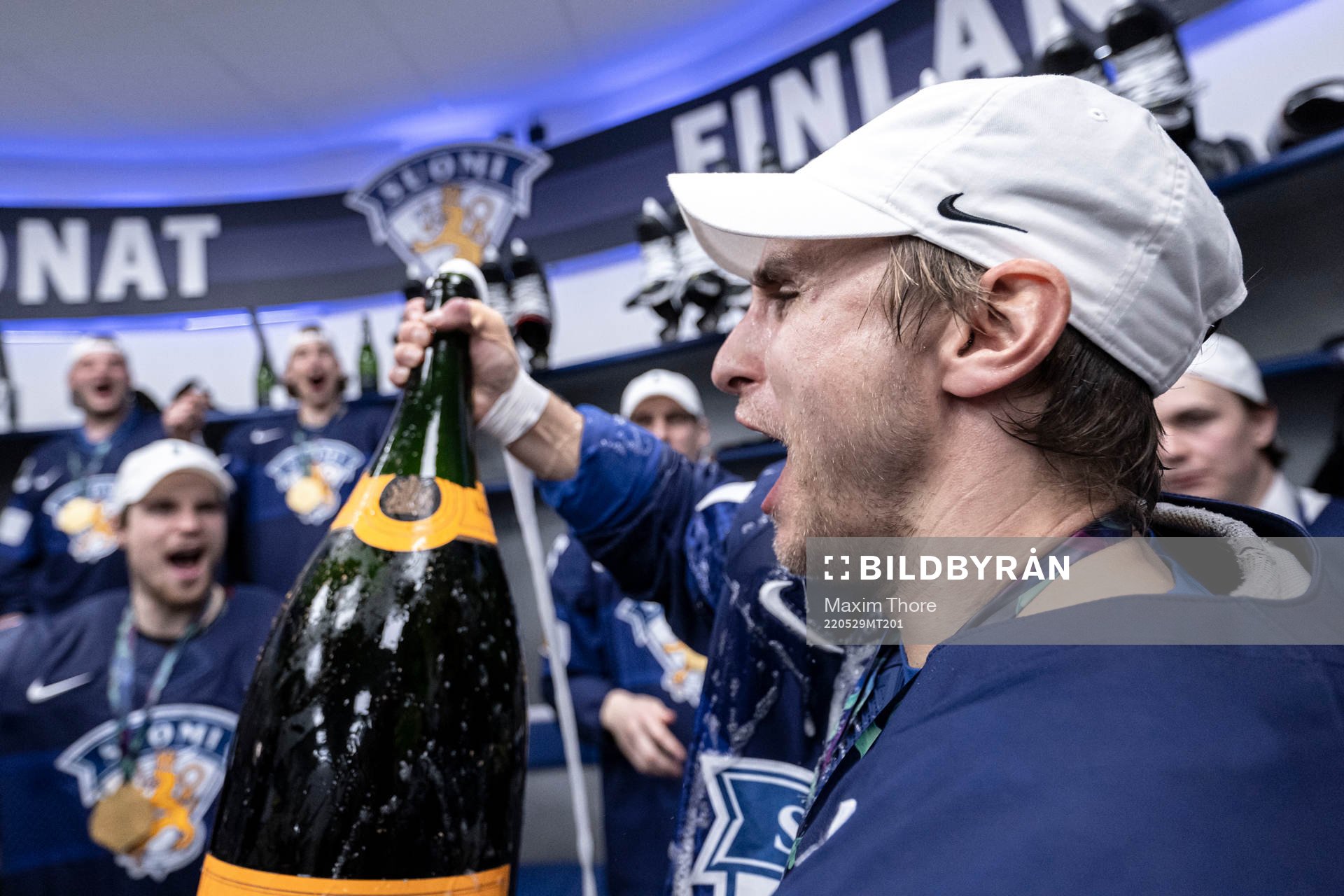 Valtteri Filppula of Finland celebrate in the locker room