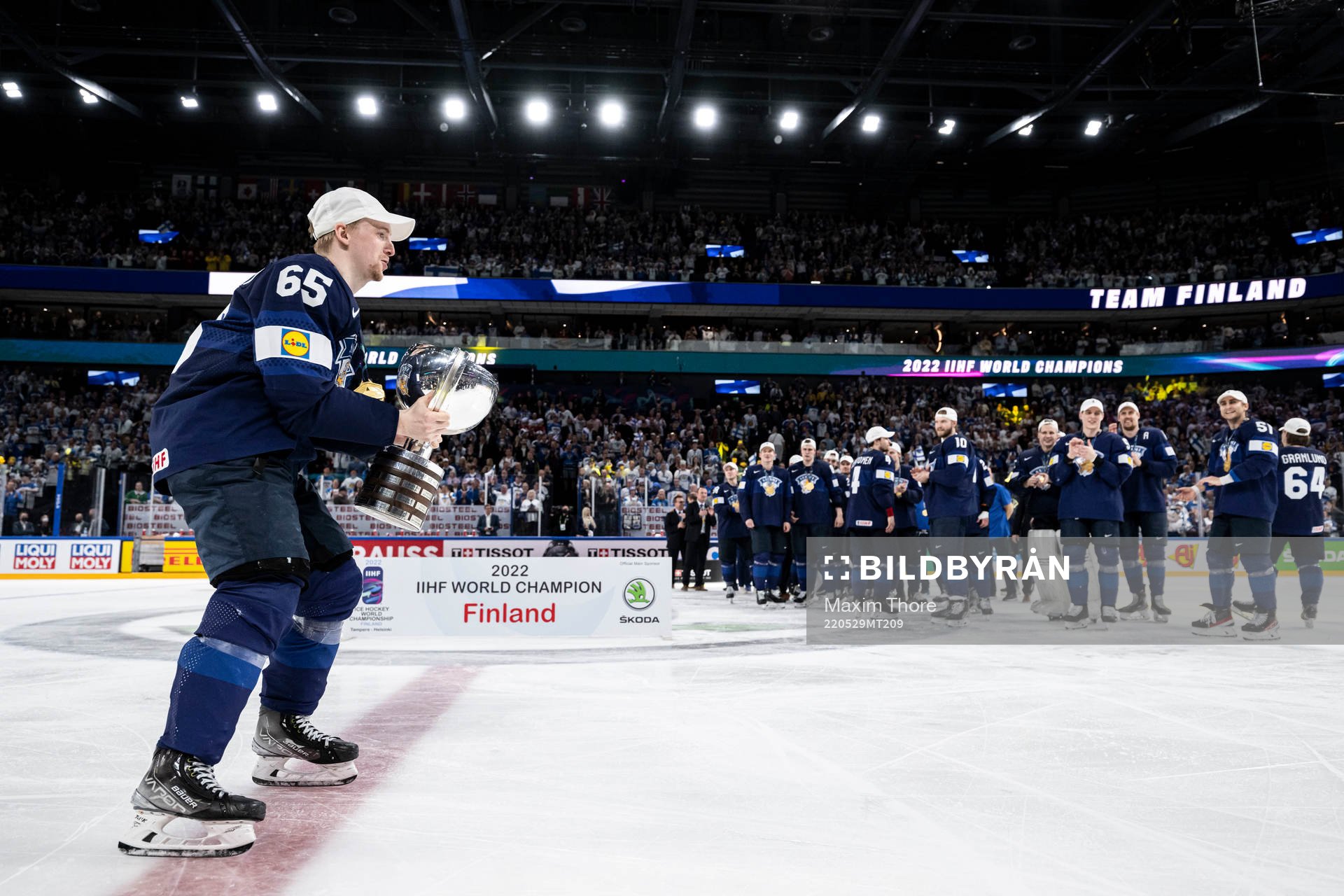 Sakari Manninen of Finland celebrates with the trophy