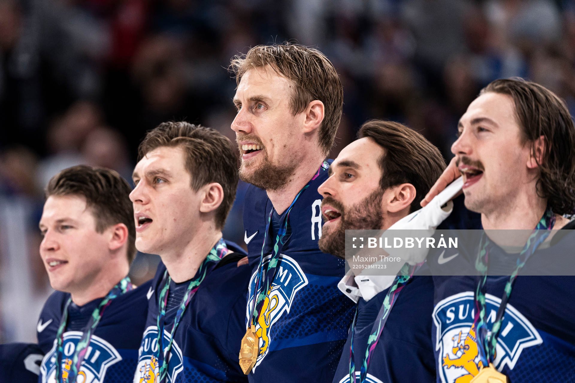 Marko Antilla of Finland with teammates