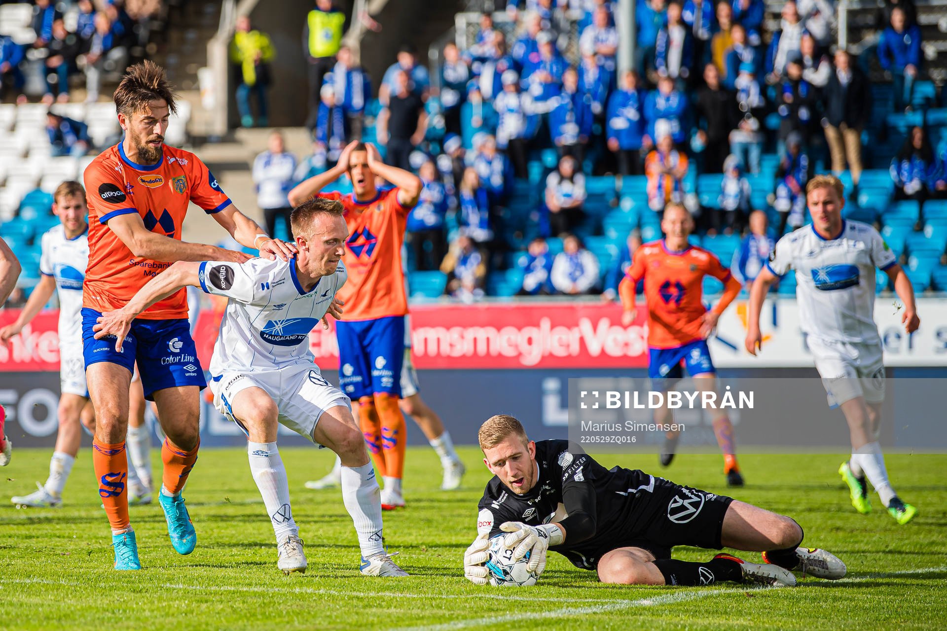 Alexander Juel Andersen of Aalesund, Søren Reese and Egil Selvik of Haugesund during the Eliteserien match between Haugesund and Aalesund on May 29, 2022 in Haugesund.