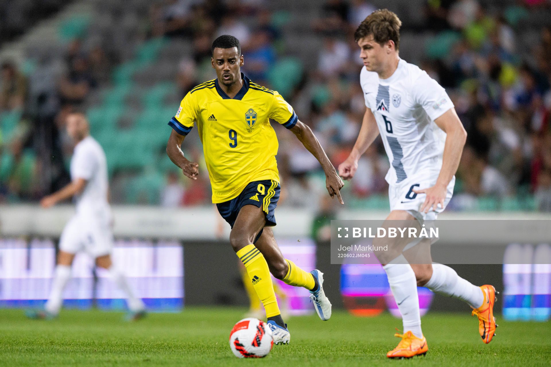 Alexander Isak of Sweden and Jaka Bijol of Slovenia