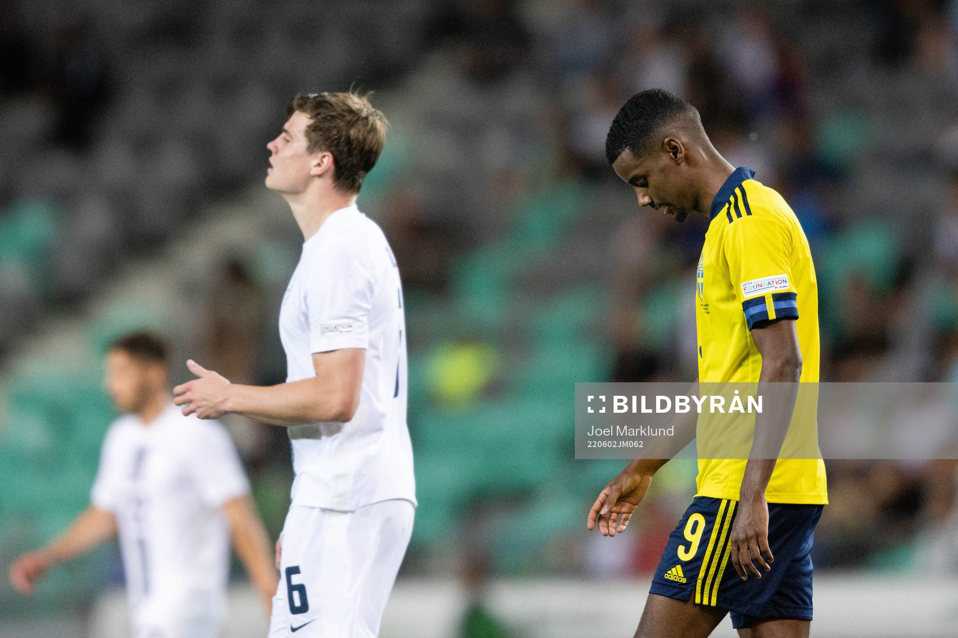 Jaka Bijol of Slovenia and Alexander Isak of Sweden