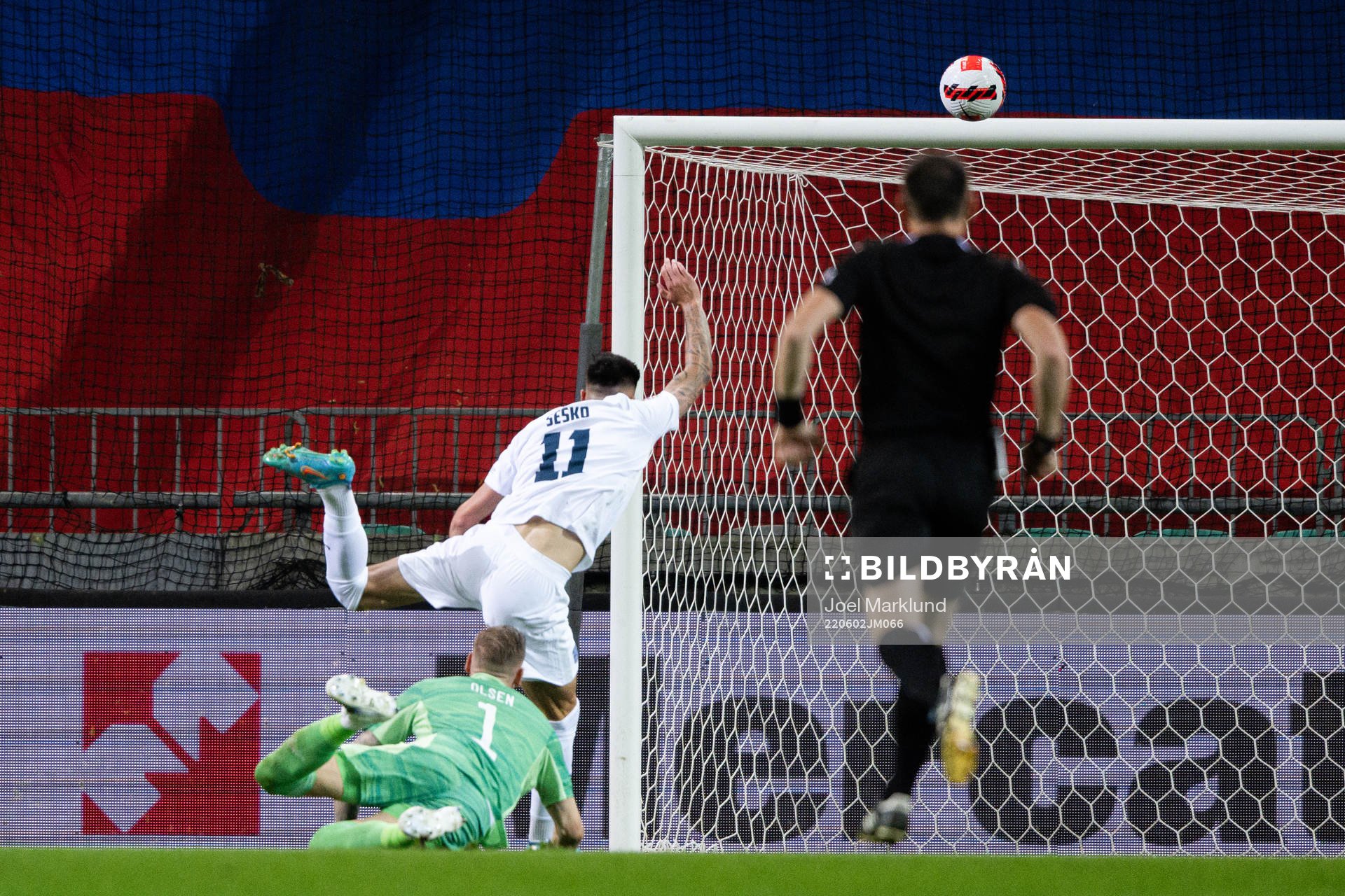 Benjamin Sesko of Slovenia against goalkeeper Robin Olsen