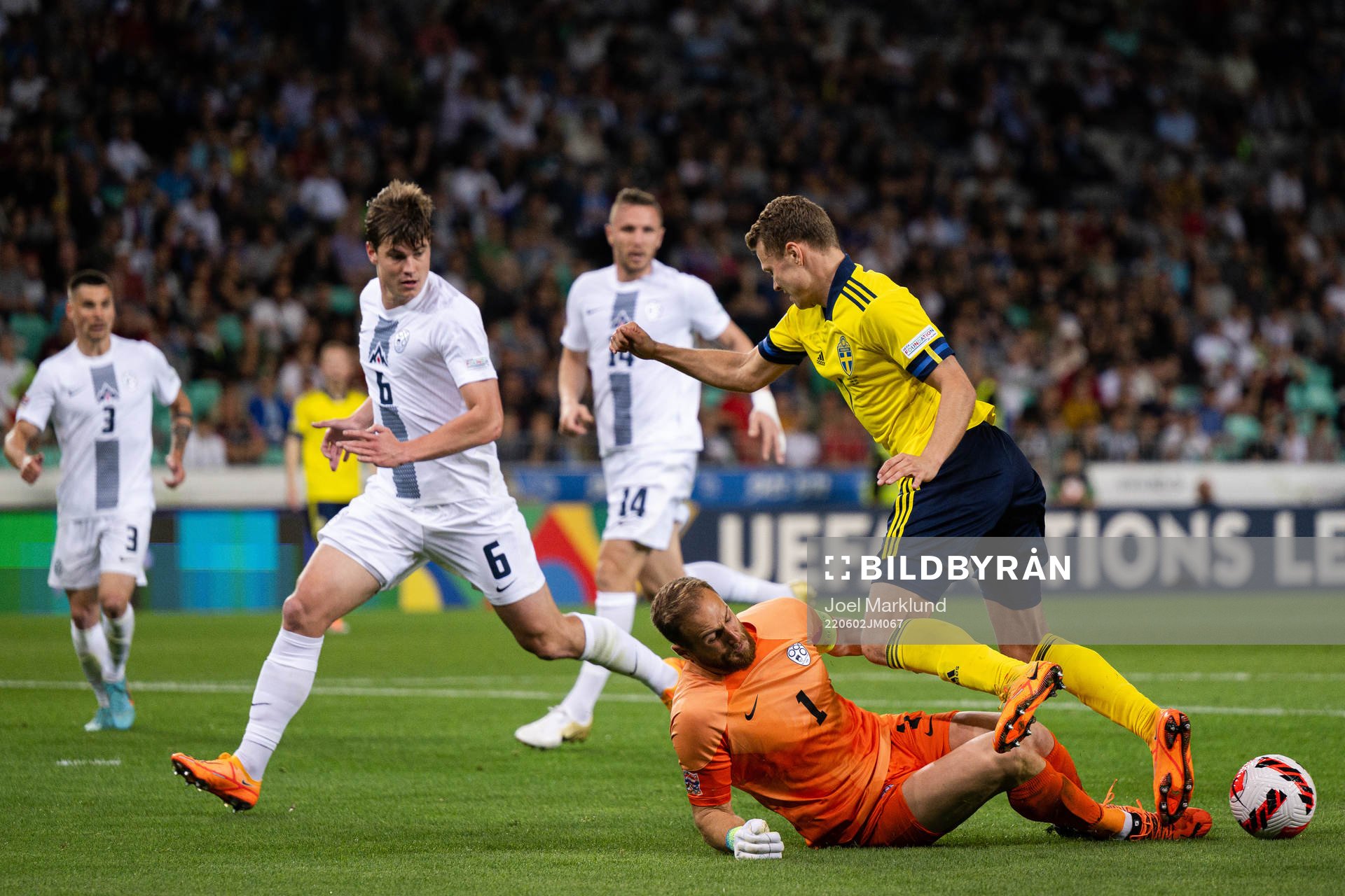 Jaka Bijol and goalkeeper Jan Oblak of Slovenia against