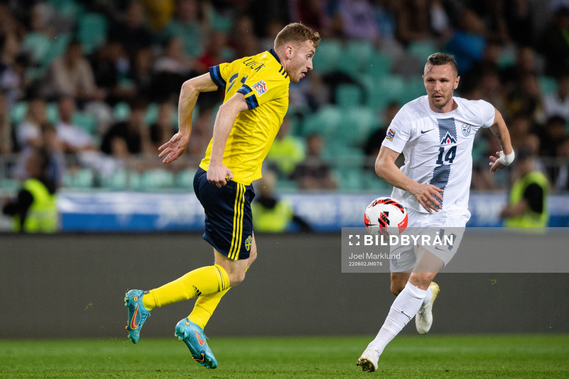 Dejan Kulusevski of Sweden and Jasmin Kurtic of Slovenia during the Nations League football match between Slovenia and Sweden on June 2, 2022 in Ljubljana.