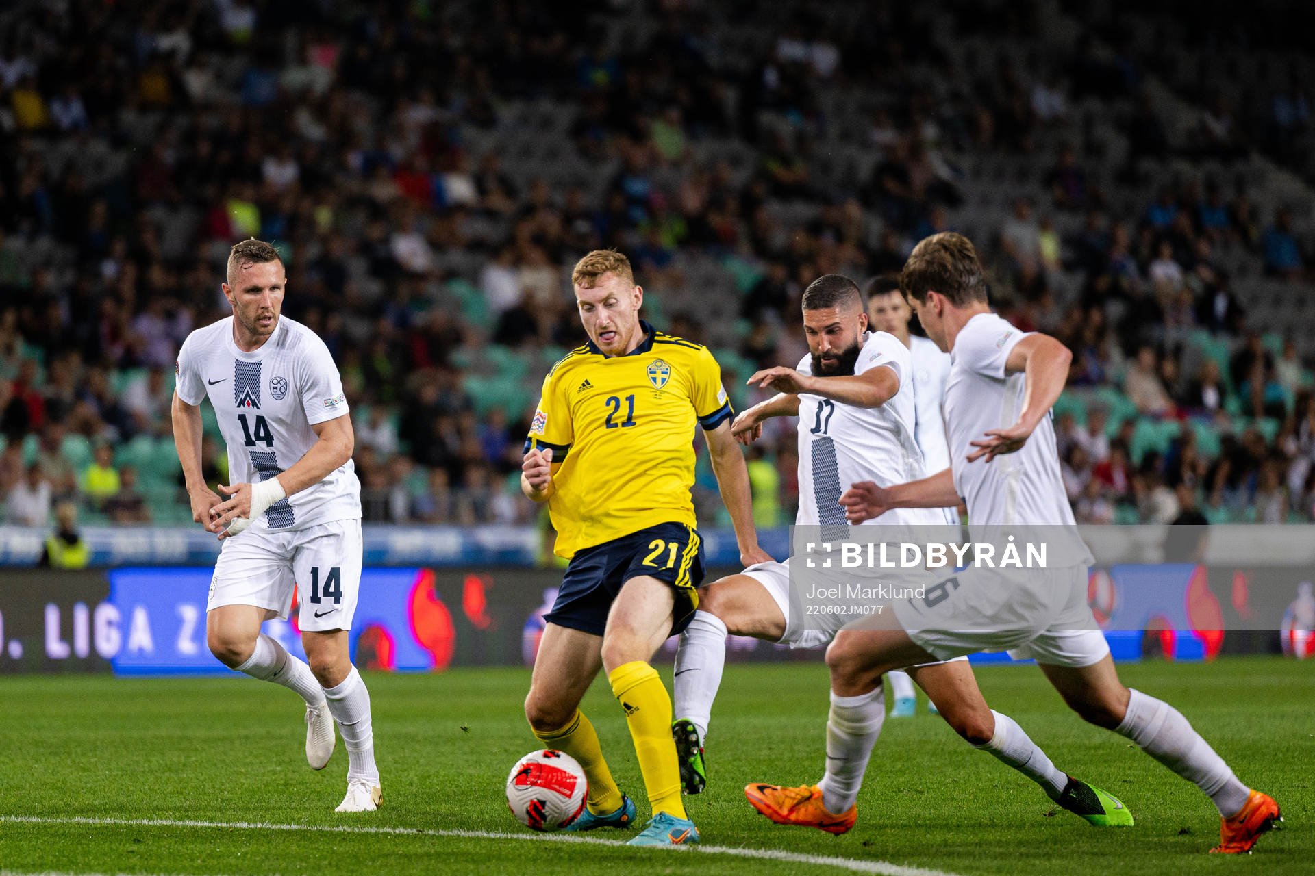 Dejan Kulusevski of Sweden against Jasmin Kurtic, Miha