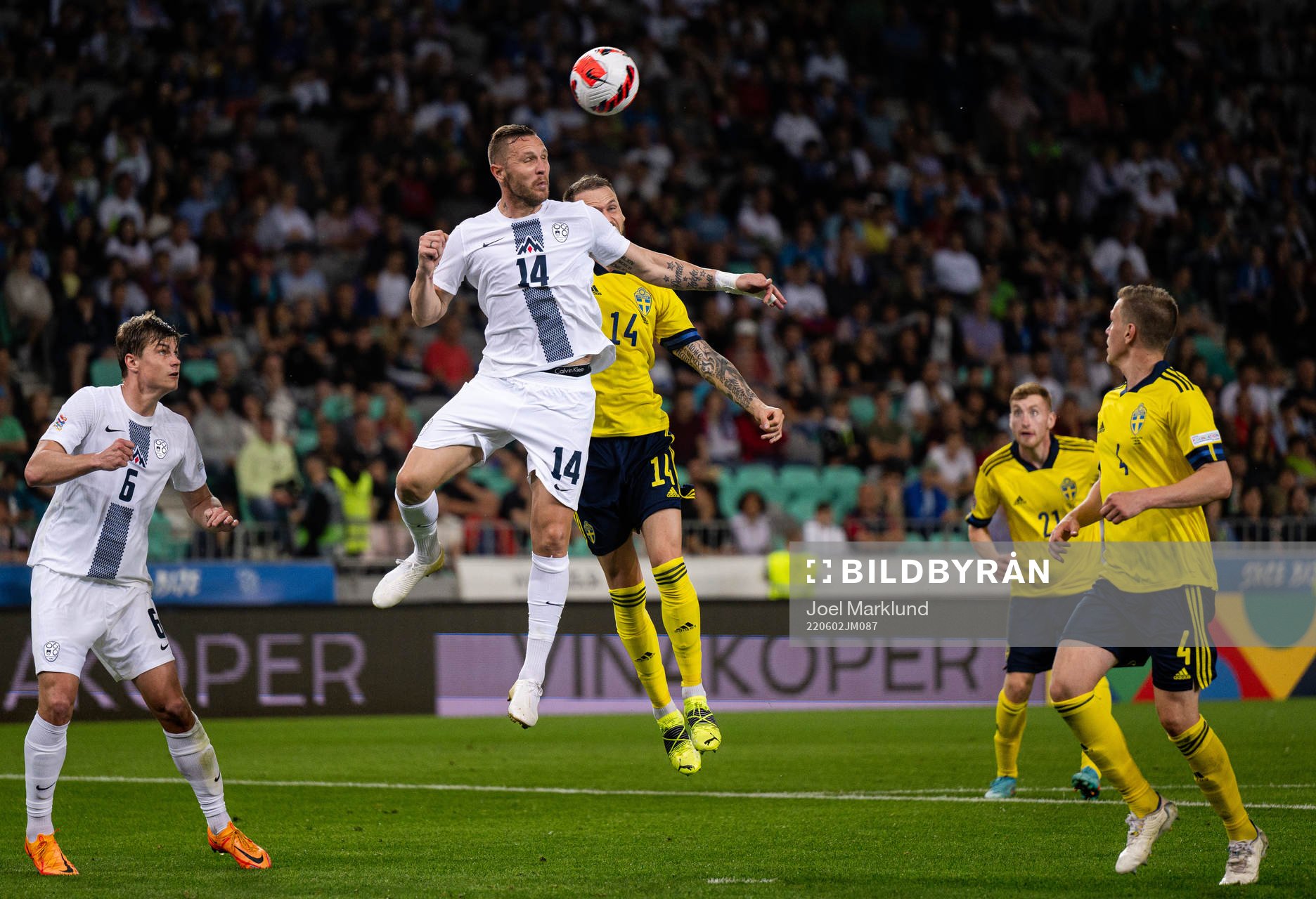 Jaka Bijol and Jasmin Kurtic of Slovenia abasing Alexander Milosevic and Joakim Nilsson of Sweden during the Nations League football match between Slovenia and Sweden on June 2, 2022 in Ljubljana.