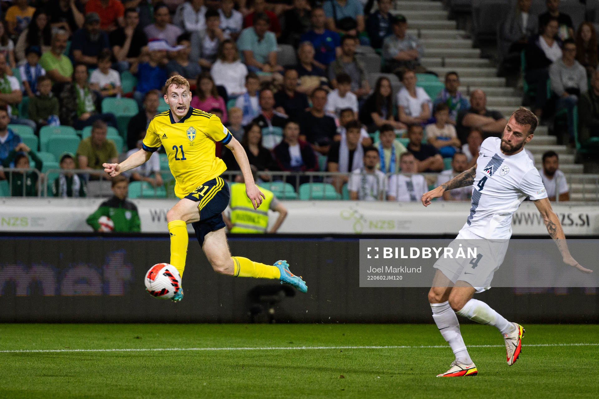 Dejan Kulusevski of Sweden and Miha Blazic of Slovenia
