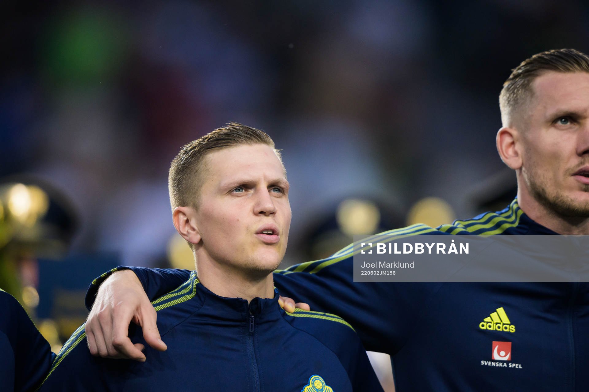 Joakim Nilsson and goalkeeper Robin Olsen of Sweden