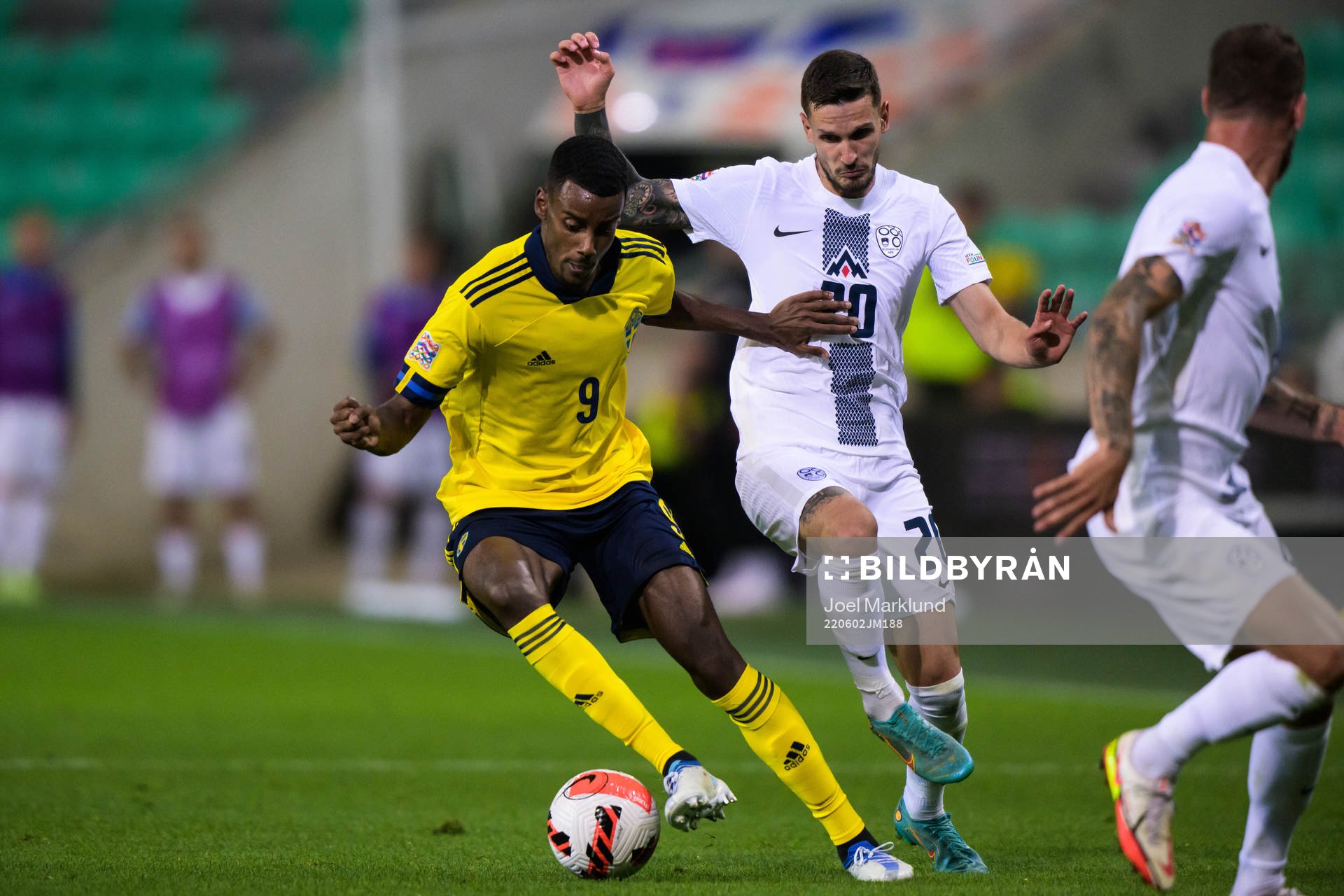 Alexander Isak of Sweden and Petar Stojanovic of Slovenia
