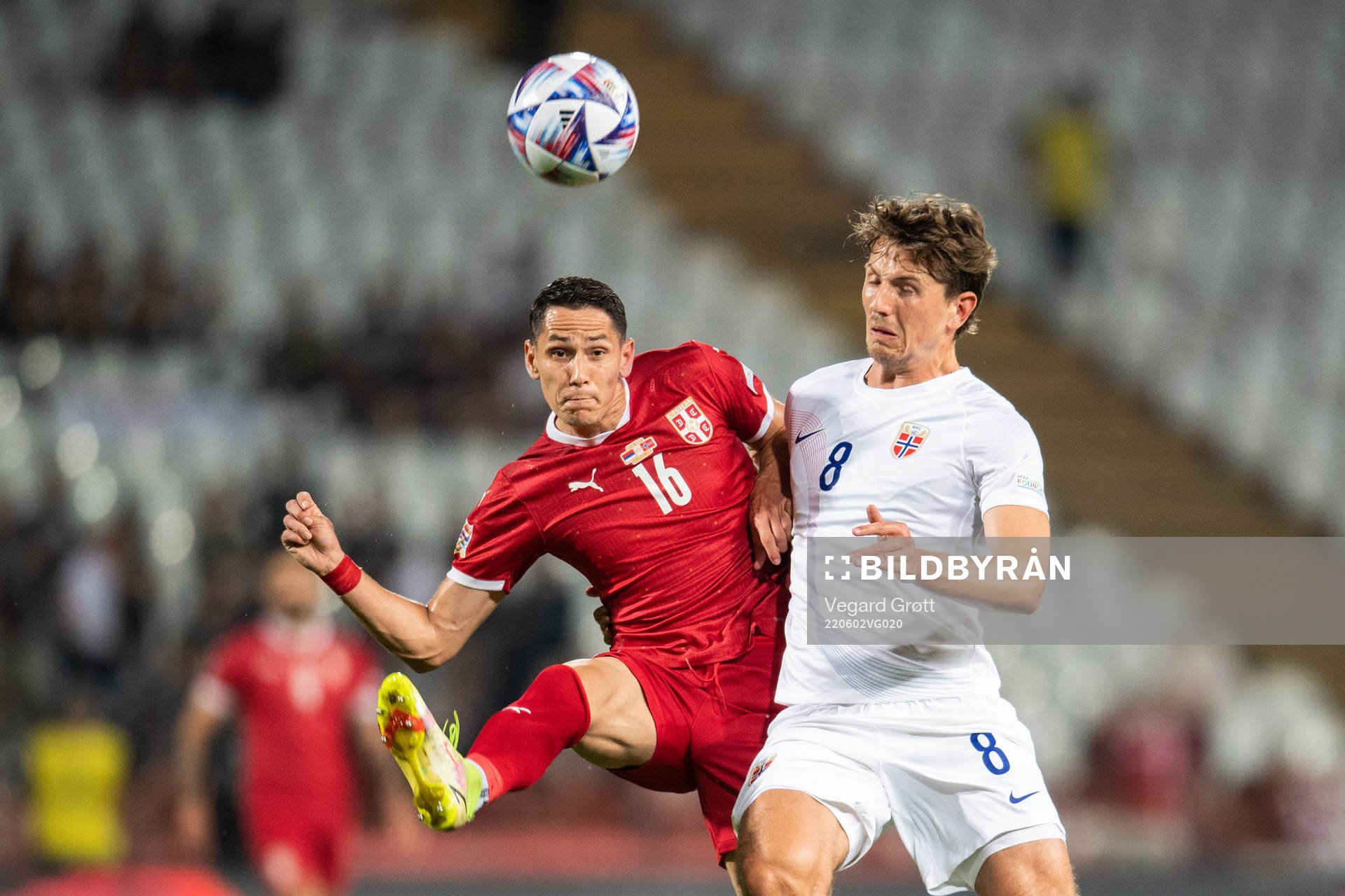 Sasa Lukić of Serbia and Sander Berge of Norway