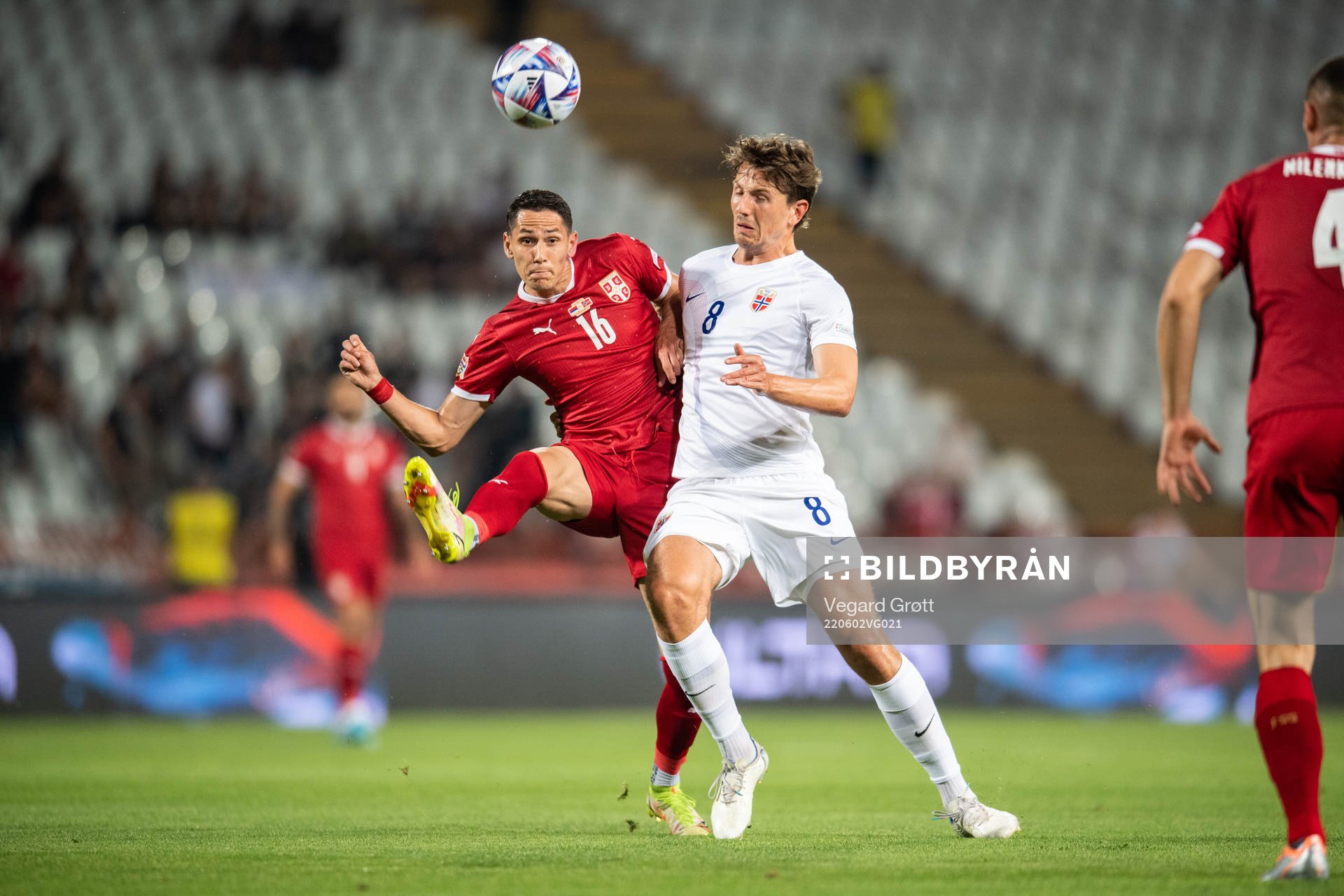 Sasa Lukić of Serbia and Sander Berge of Norway