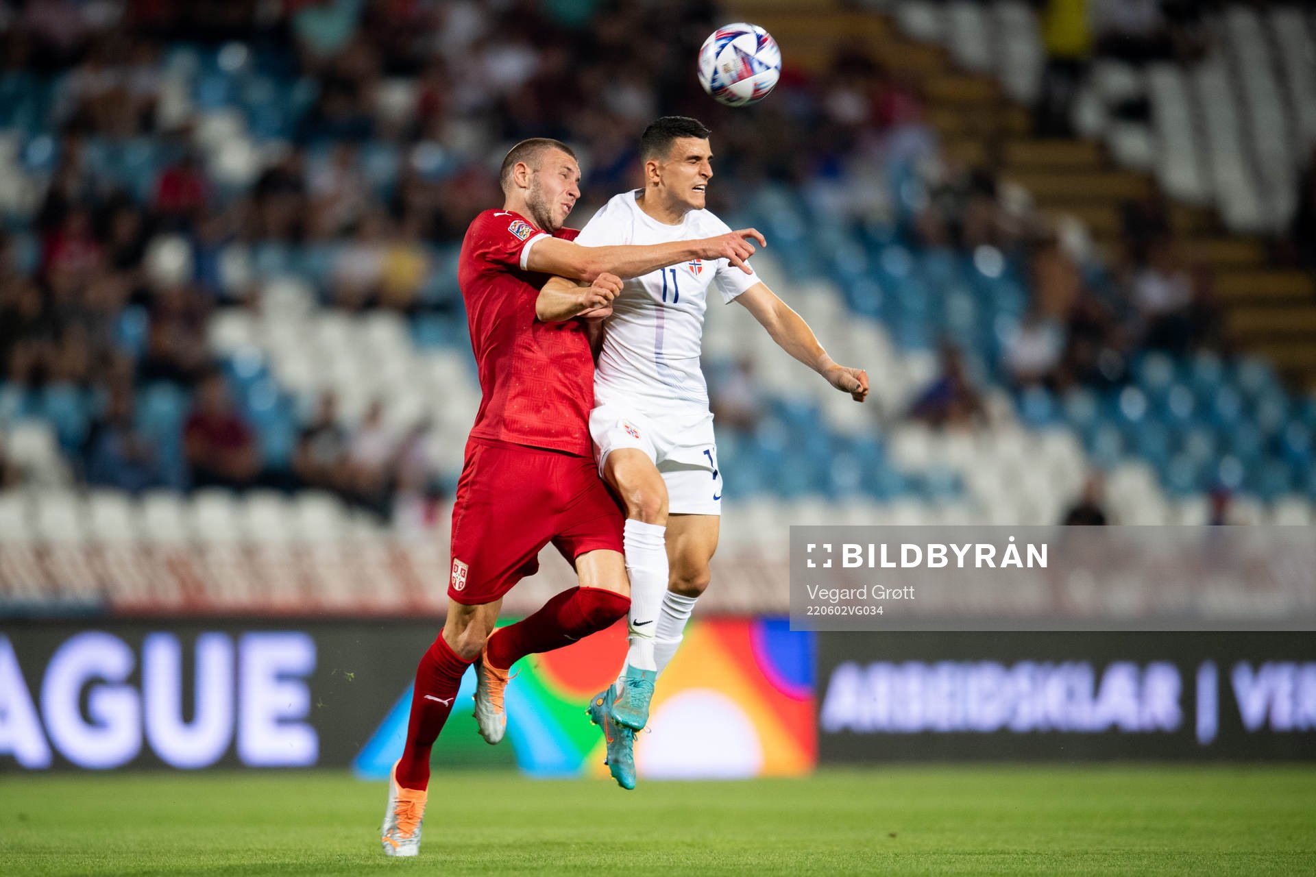 Strahinja Pavlović of Serbia and Mohamed Elyounoussi of