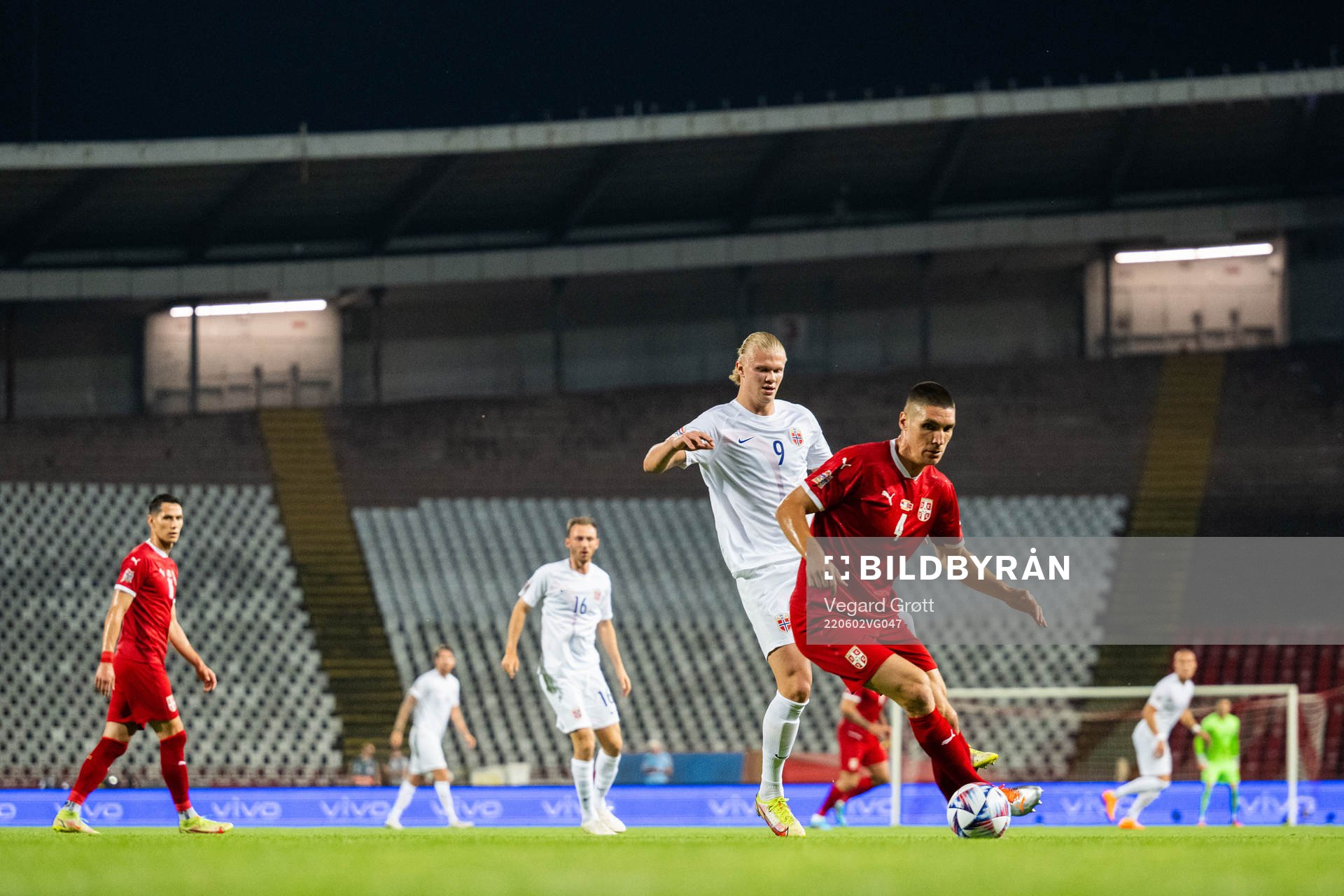 Erling Braut Haaland of Norway and Nikola Milenković of