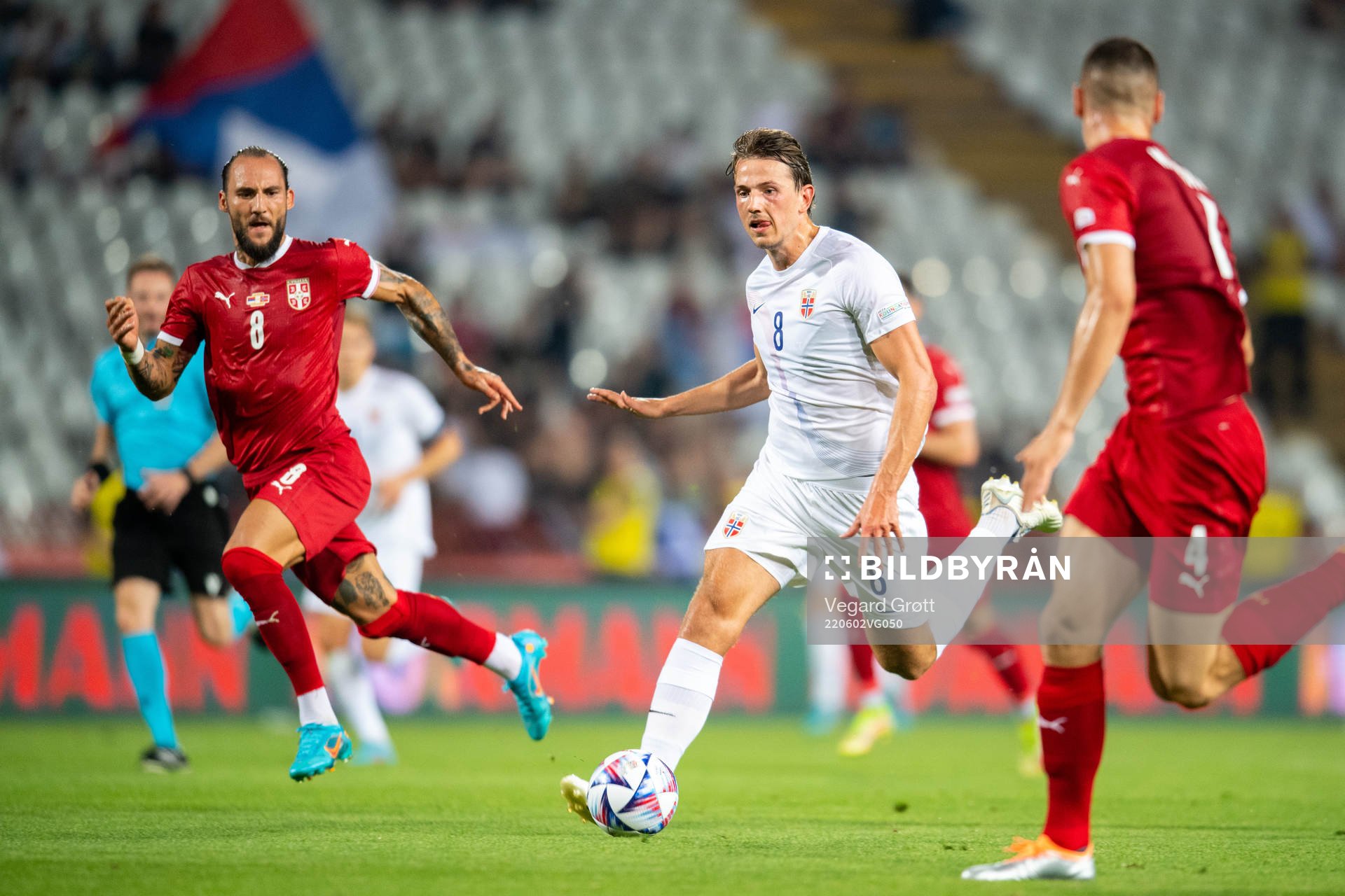 Nemanja Gudelj of Serbia and Sander Berge of Norway