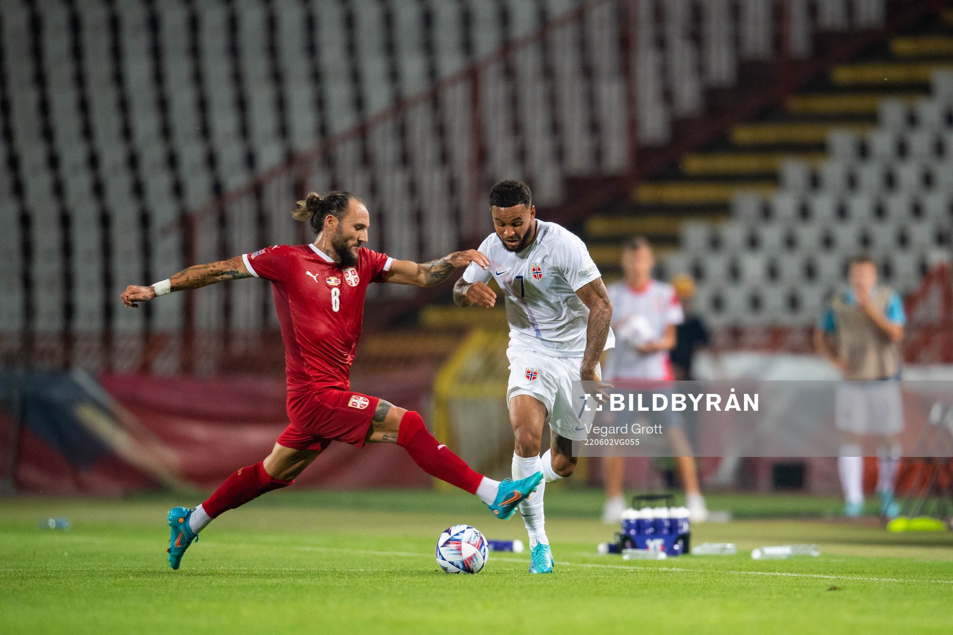Nemanja Gudelj of Serbia and Joshua King of Norway