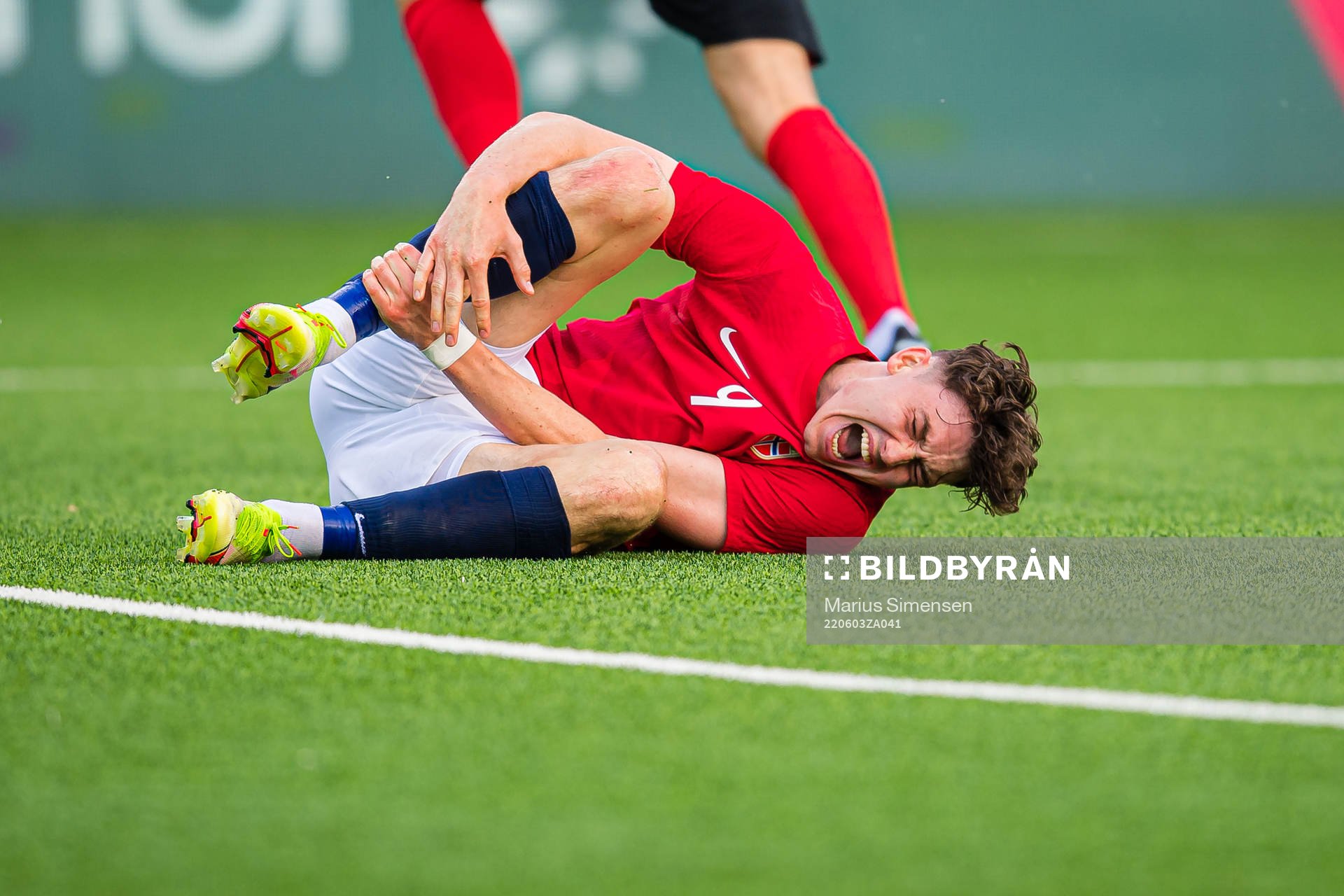 Jørgen Strand Larsen of Norway in pain