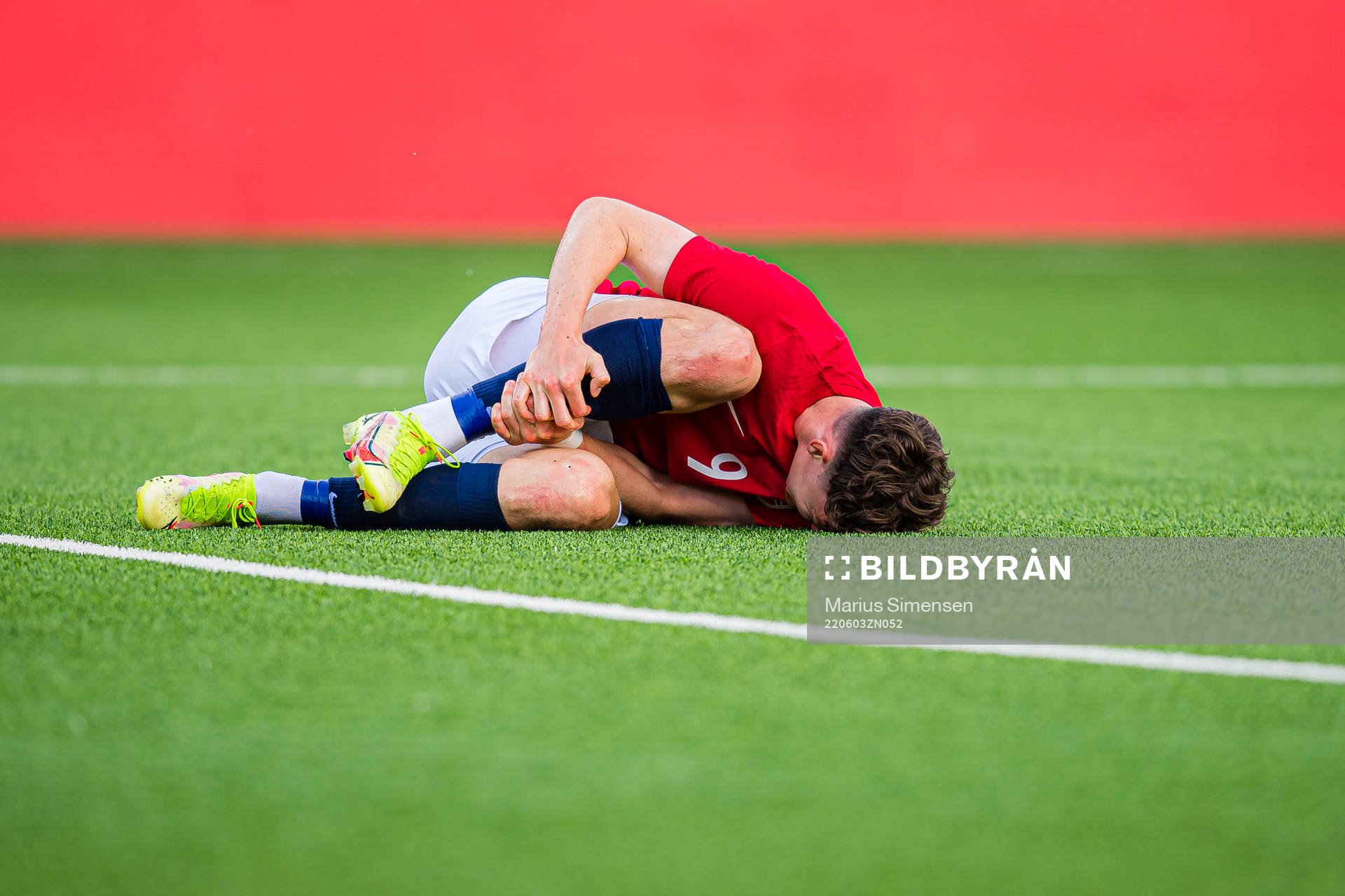 Jørgen Strand Larsen of Norway in pain