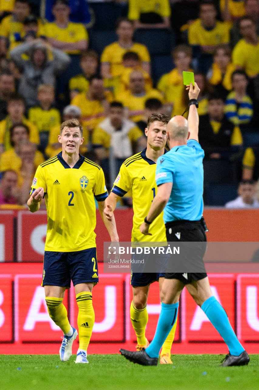 Emil Krafth reacts as Mattias Svanberg of Sweden is shown a