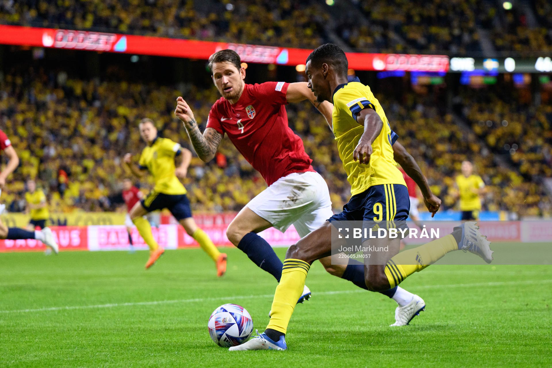 Stefan Strandberg of Norway and Alexander Isak of Sweden