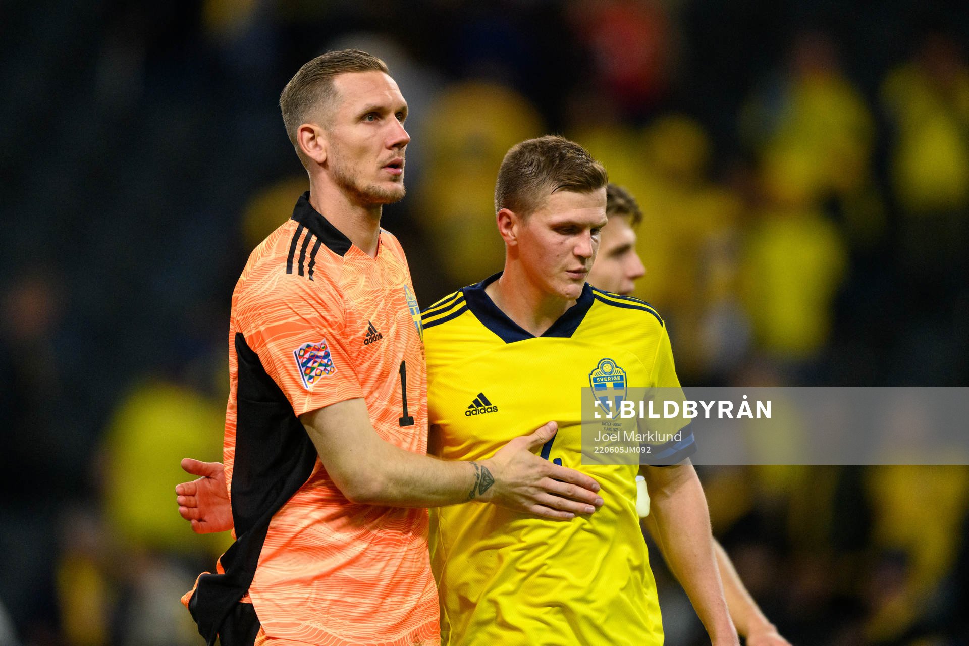 Goalkeeper Robin Olsen and Joakim Nilsson of Sweden