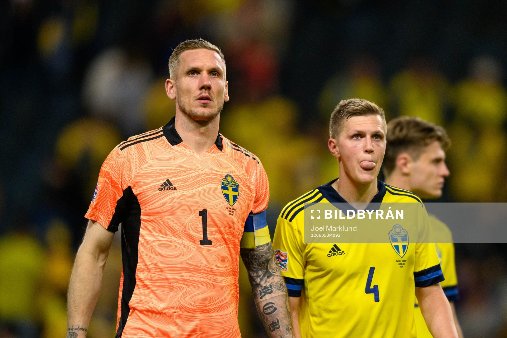 Goalkeeper Robin Olsen and Joakim Nilsson of Sweden