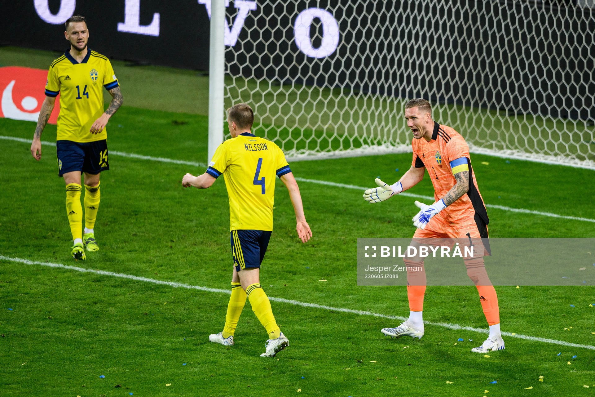 goalkeeper Robin Olsen reacts towards Joakim Nilsson of