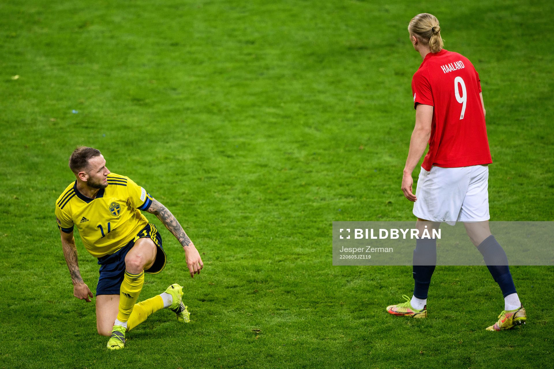 Alexander Milosevic of Sweden and Erling Braut Haaland of