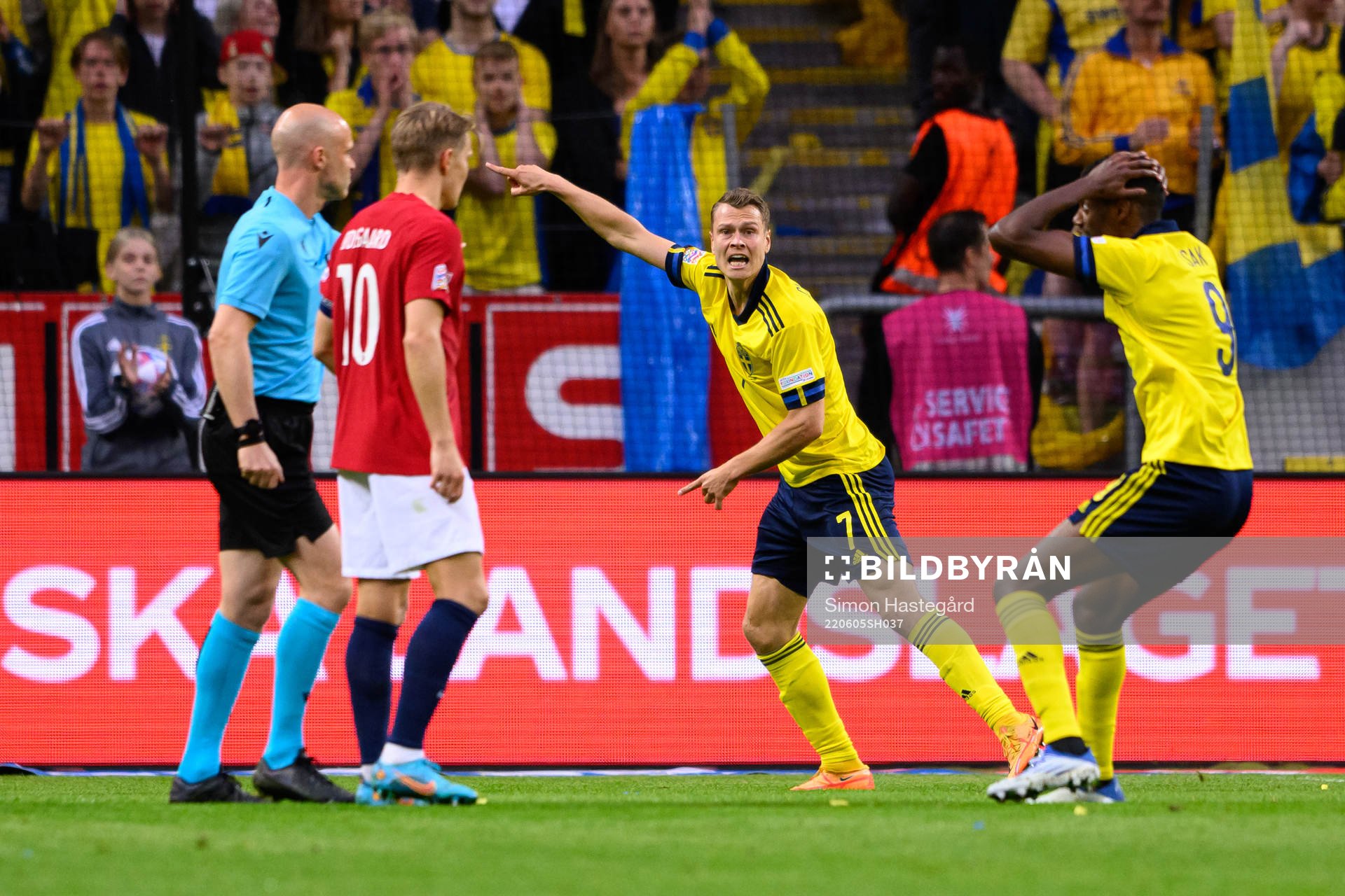 Viktor Claesson and Alexander Isak of Sweden  reacts