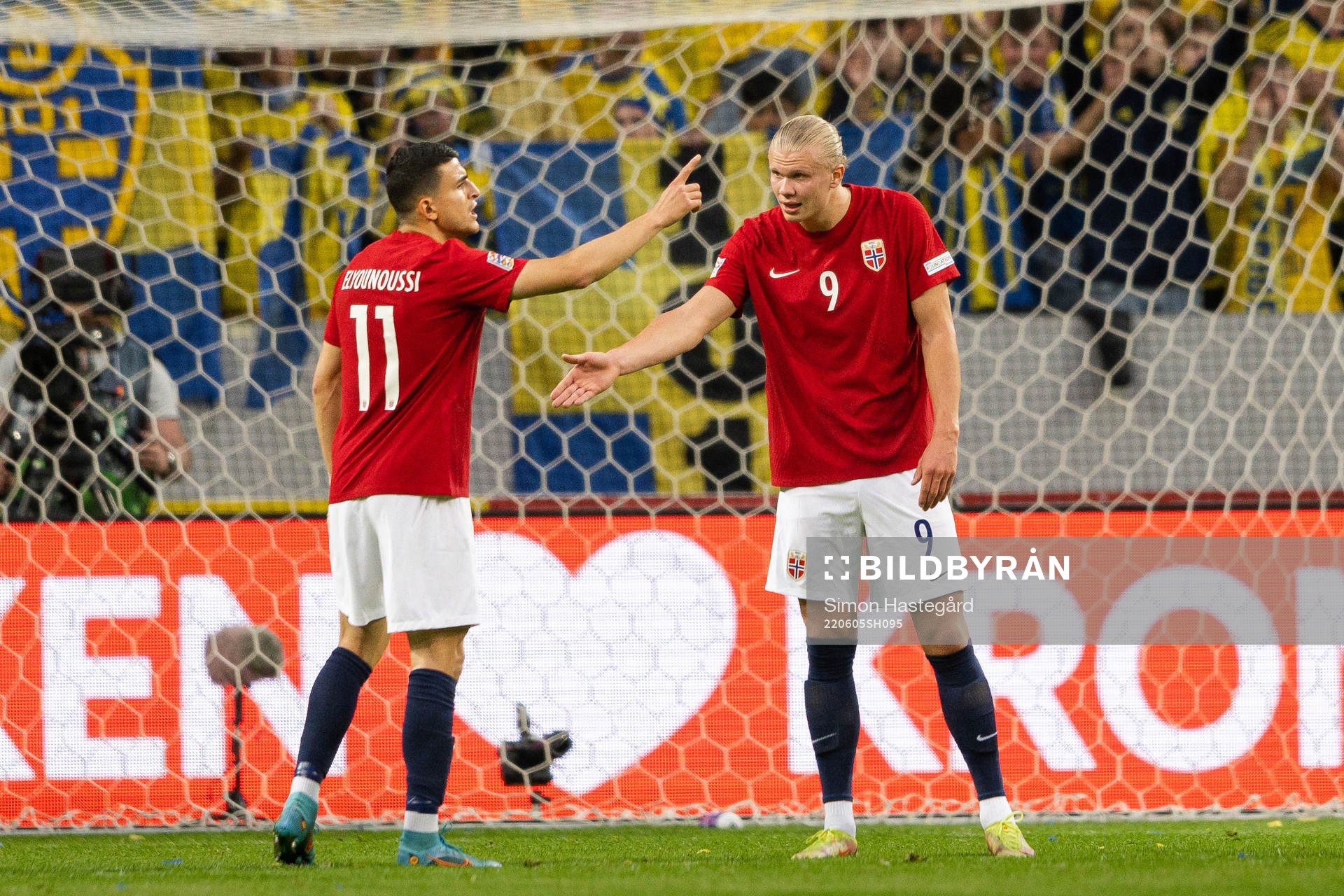 Mohamed Elyounoussi and Erling Braut Haaland of Norway