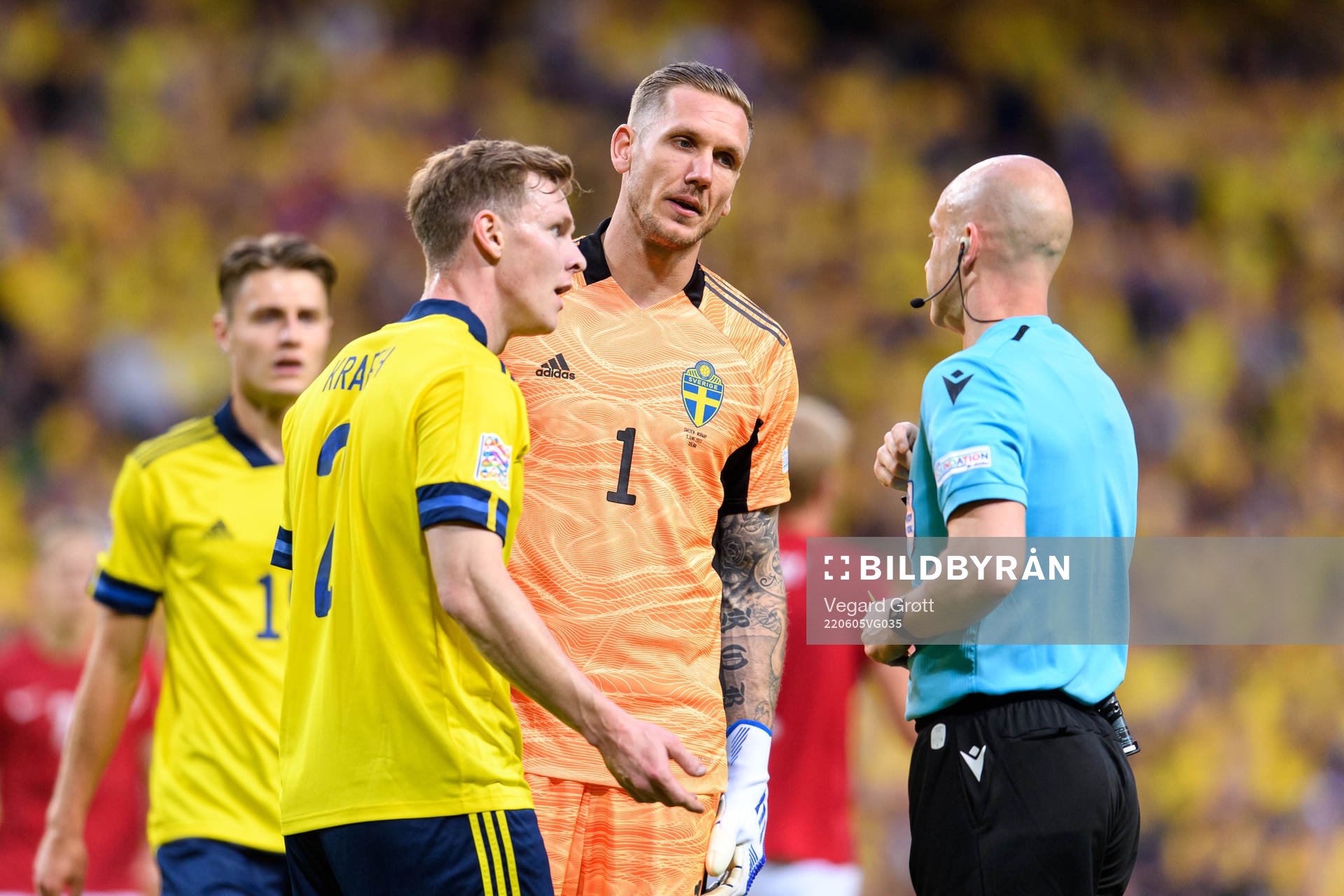 Emil Krafth of Sweden receives a yellow card