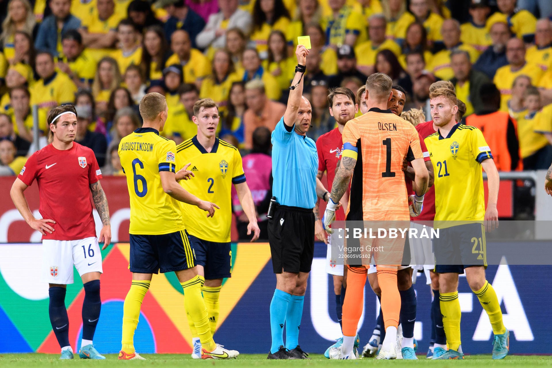 Goalkeeper Robin Olsen of Sweden receives a yellow card
