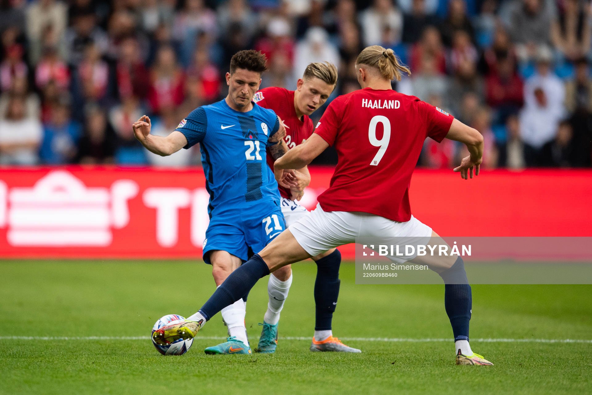 Benjamin Verbic of Slovenia and Erling Braut Haaland of