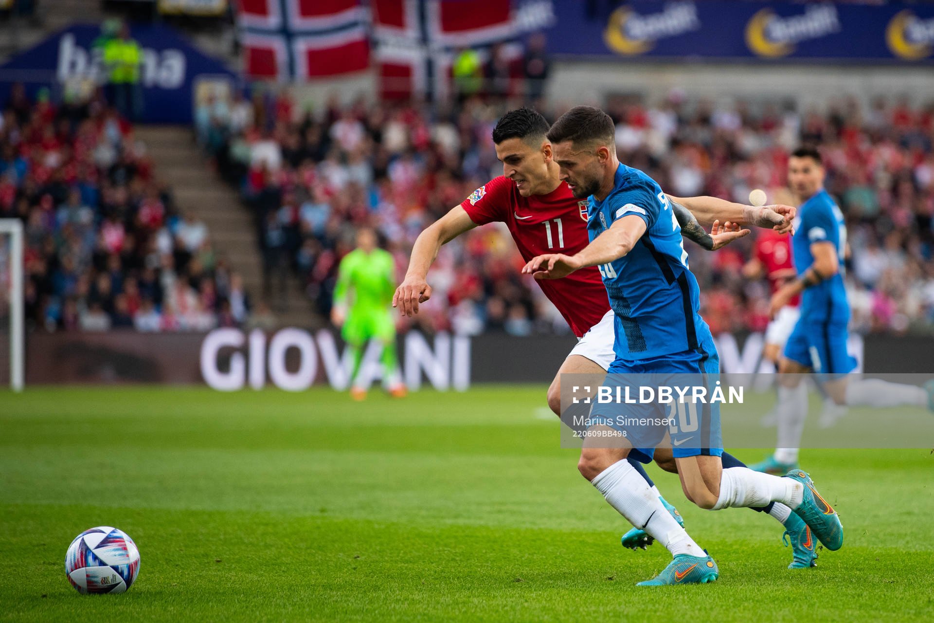 Mohamed Amine Elyounoussi of Norway and Petar Stojanovic of