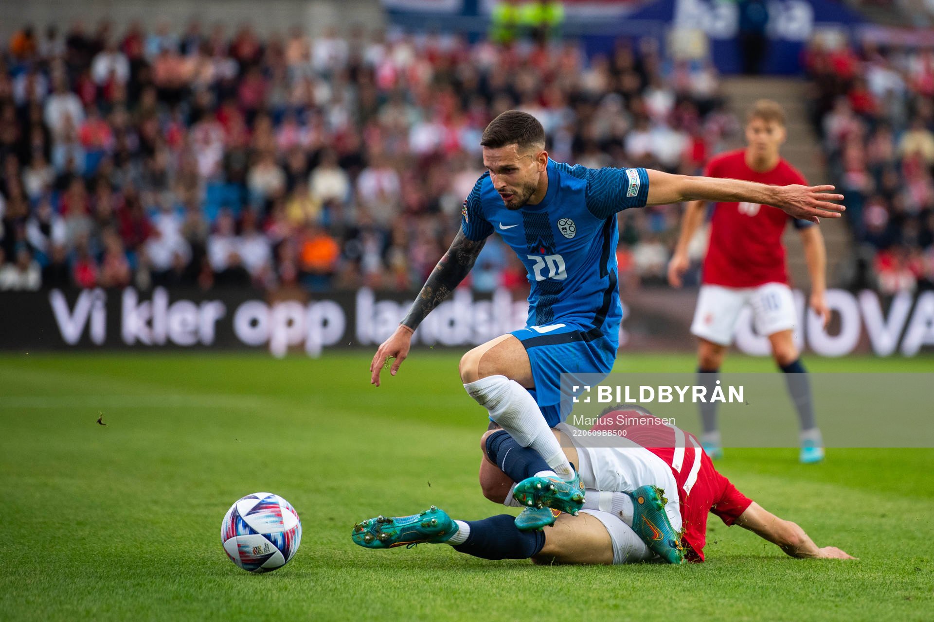 Mohamed Amine Elyounoussi of Norway and Petar Stojanovic of Slovenia during the Nations League football match between Norway and Slovenia on June 9, 2022 in Oslo. 