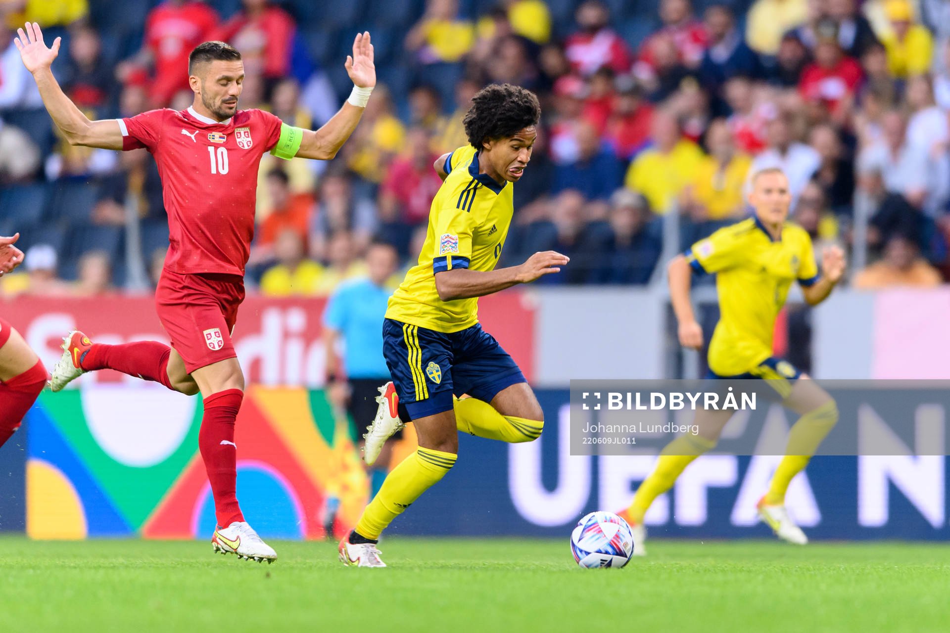 Dusan Tadic of Serbia and Jens Cajuste of Sweden