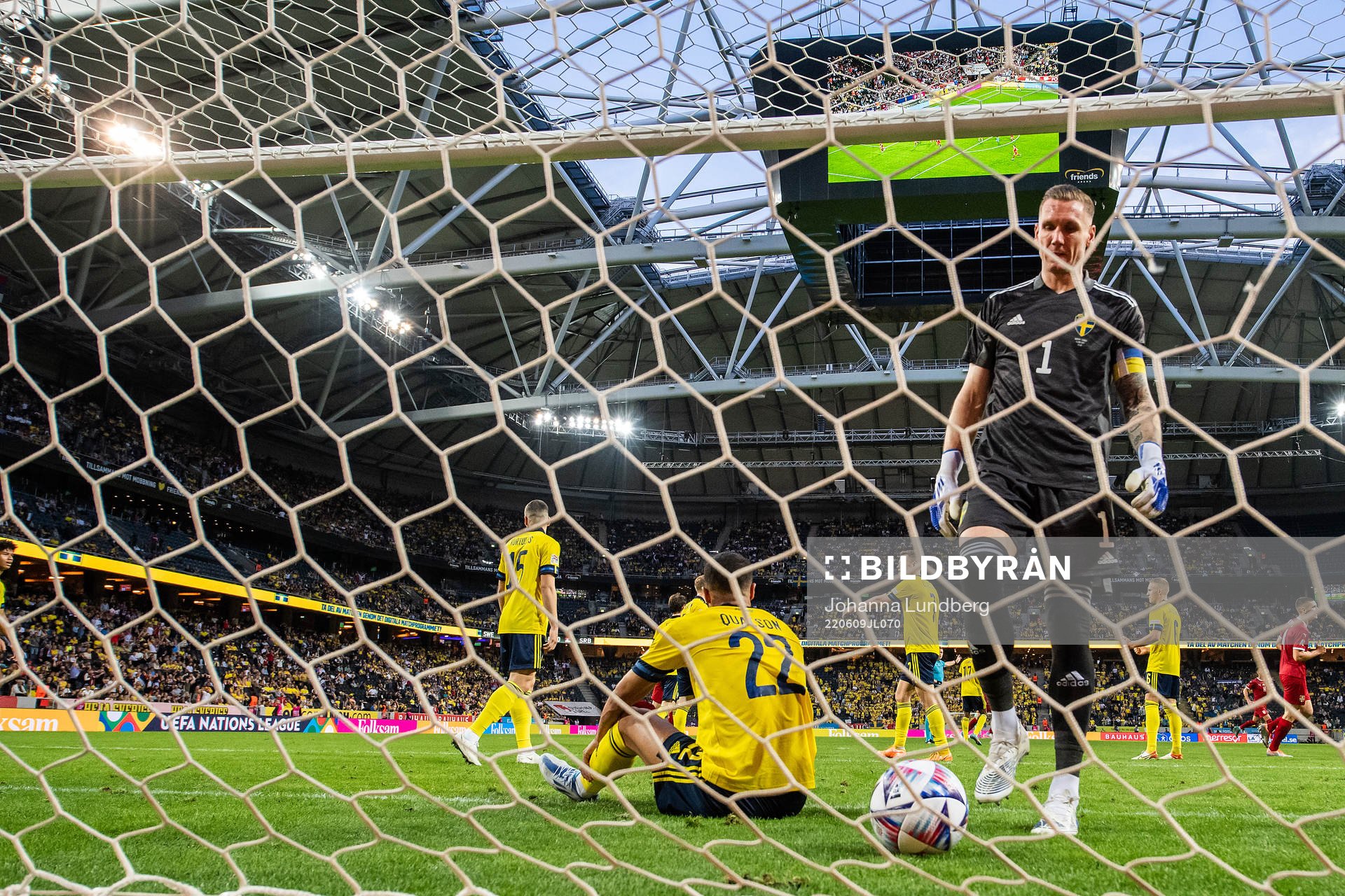 Nikola Milenkovic of Serbia scores 0-1 behind goalkeeper