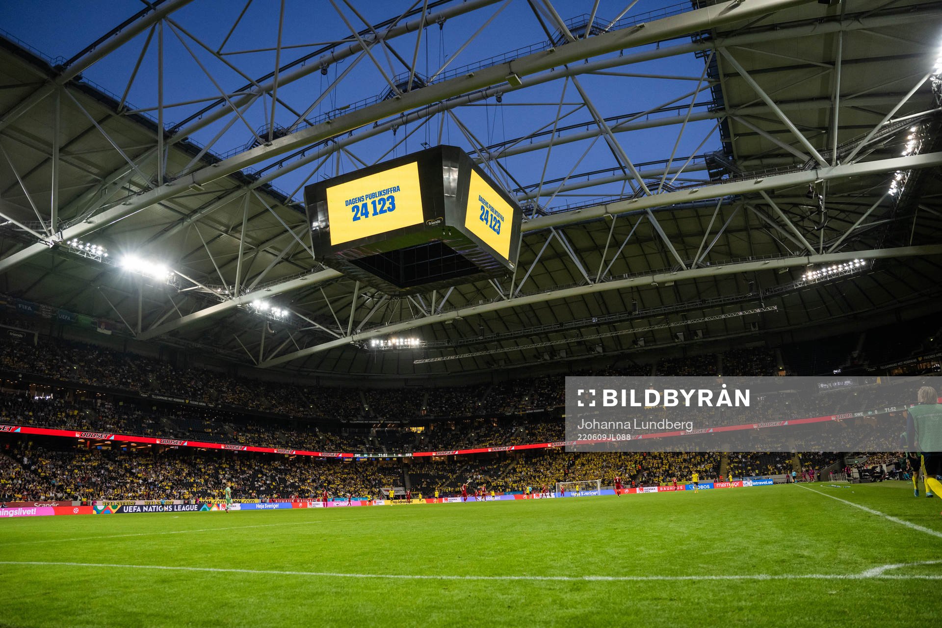 The Jumbotron shows the attendance