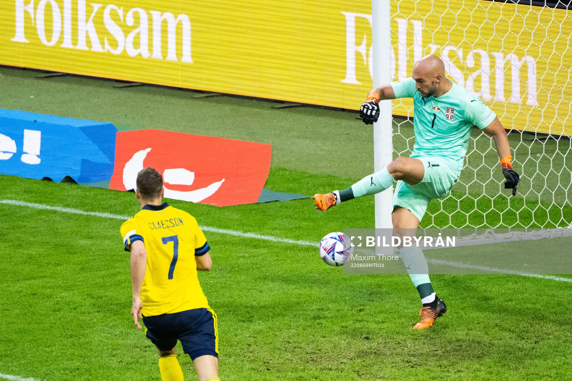 Goalkeeper Marko Dmitrovic of Serbia and Viktor Claesson of