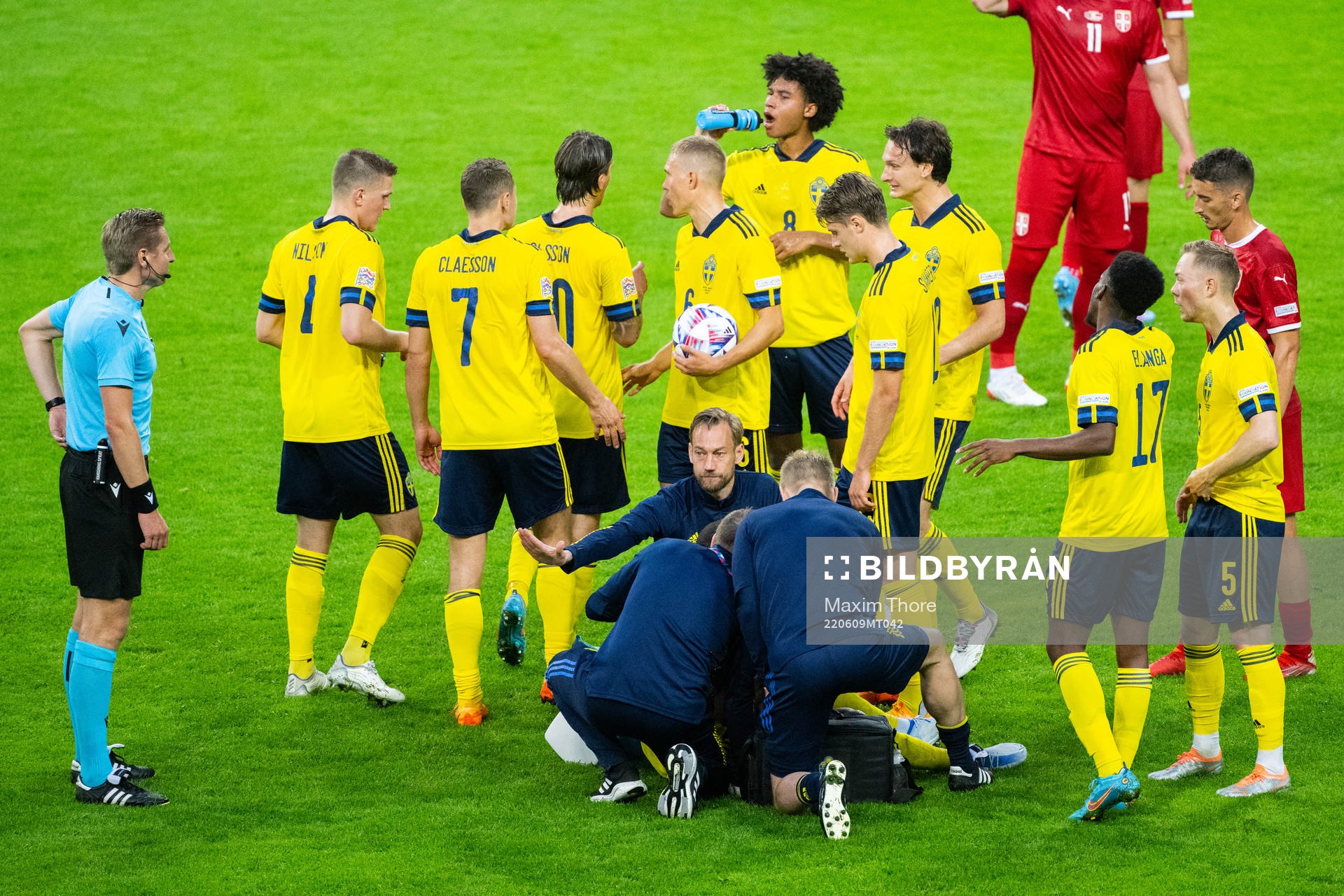 Robin Quaison of Sweden receives medical attention