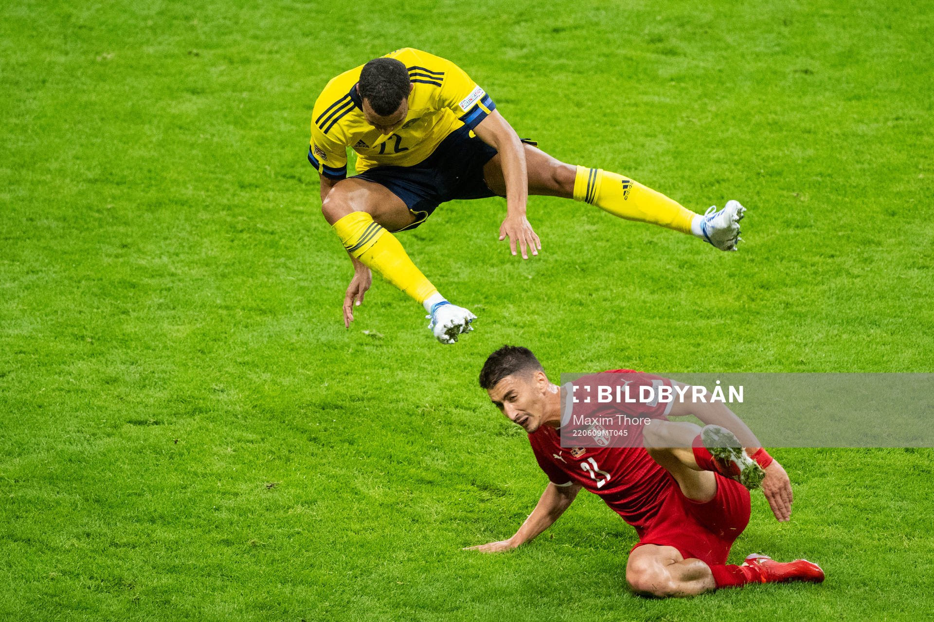 Robin Quaison of Sweden and Filip Duricic of Serbia