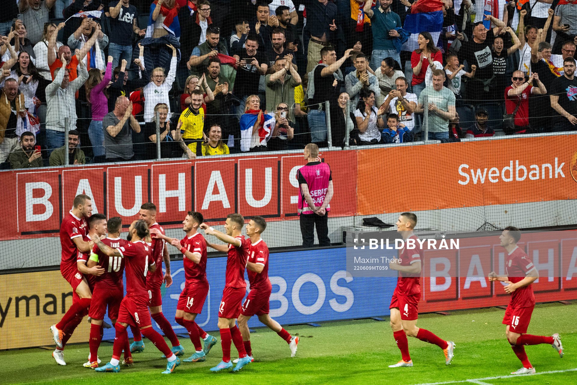 Players of of Serbia celebrate after 0-1 during the Nations League football match between Sweden and Serbia on June 9, 2022 in Stockholm. 