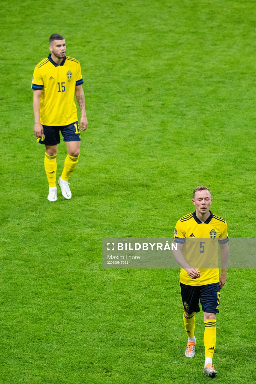Edvin Kurtulus and Joel Andersson of Sweden look dejected