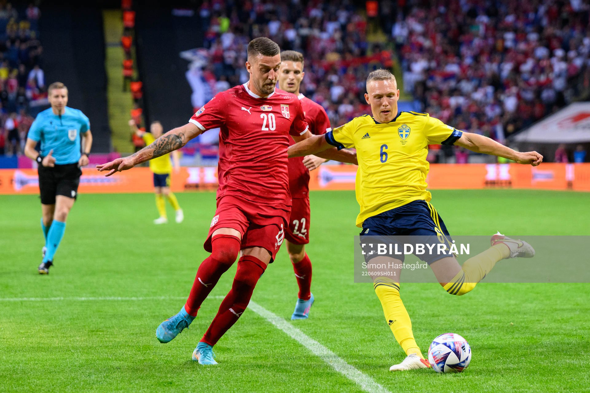 Sergej Milinkovic-Savic of Serbia and Ludwig Augustinsson of Sweden during the Nations League football match between Sweden and Serbia on June 9, 2022 in Stockholm.