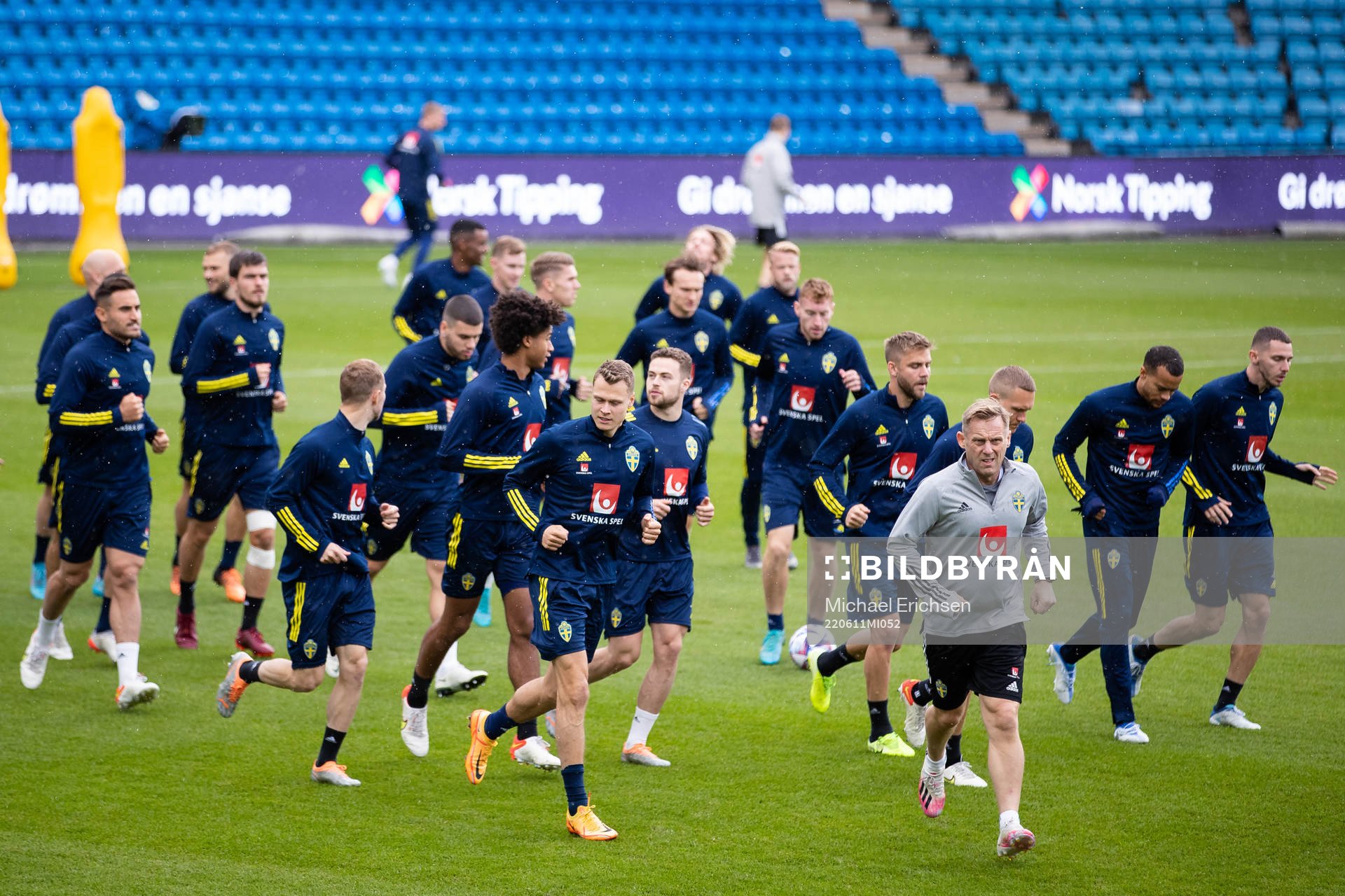 Players of the Swedish national football team warming up