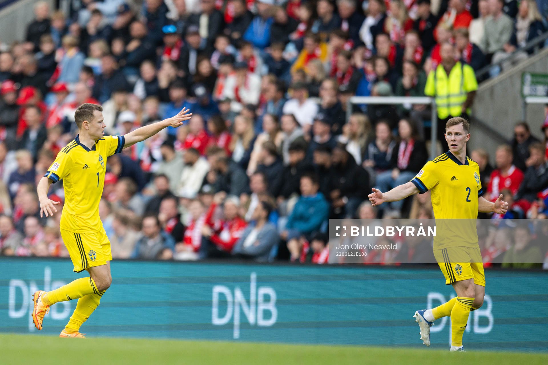 Viktor Claesson and Emil Krafth of Sweden celebrate the 2-1