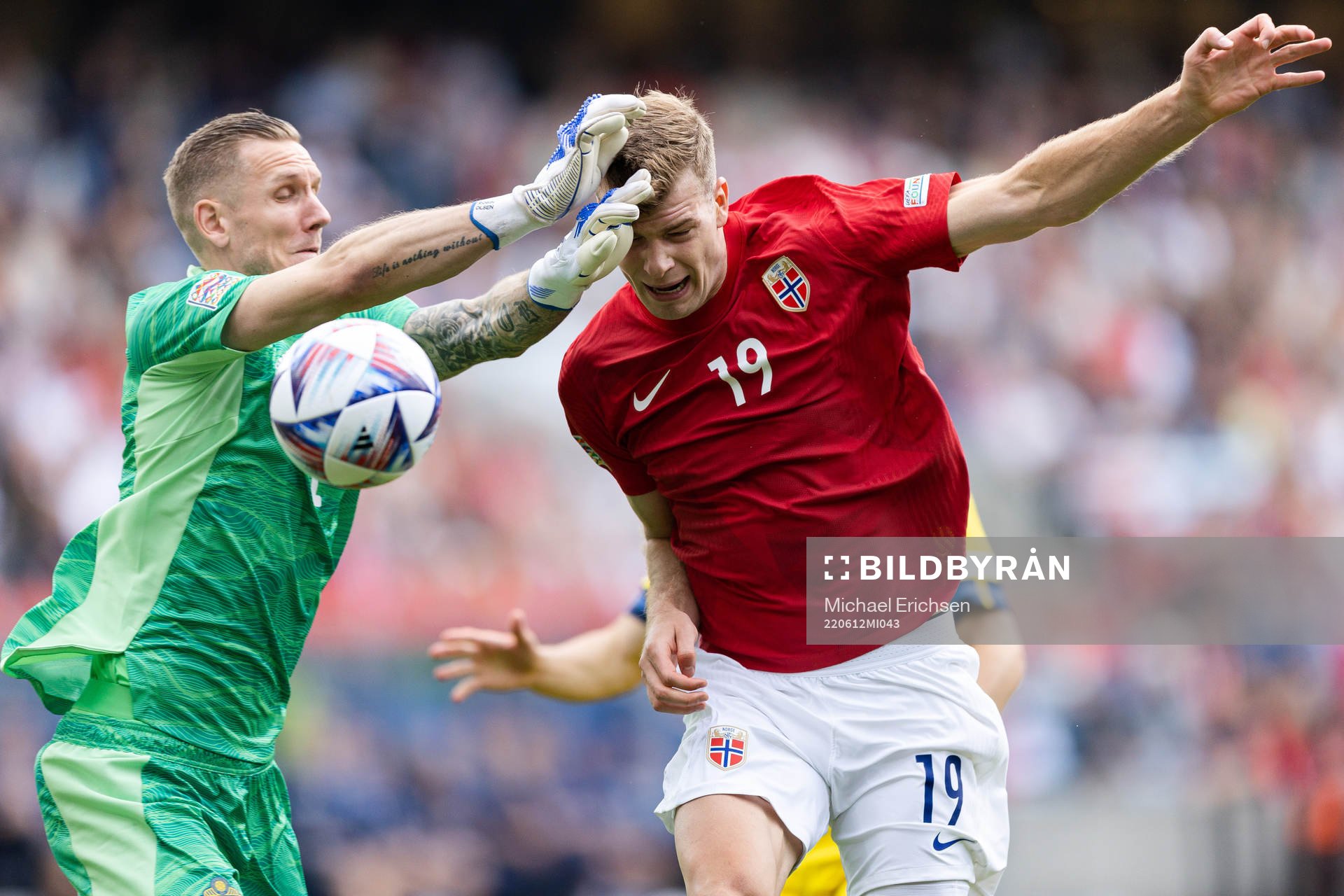 Goalkeeper Robin Olsen of Sweden and Alexander Sørloth of